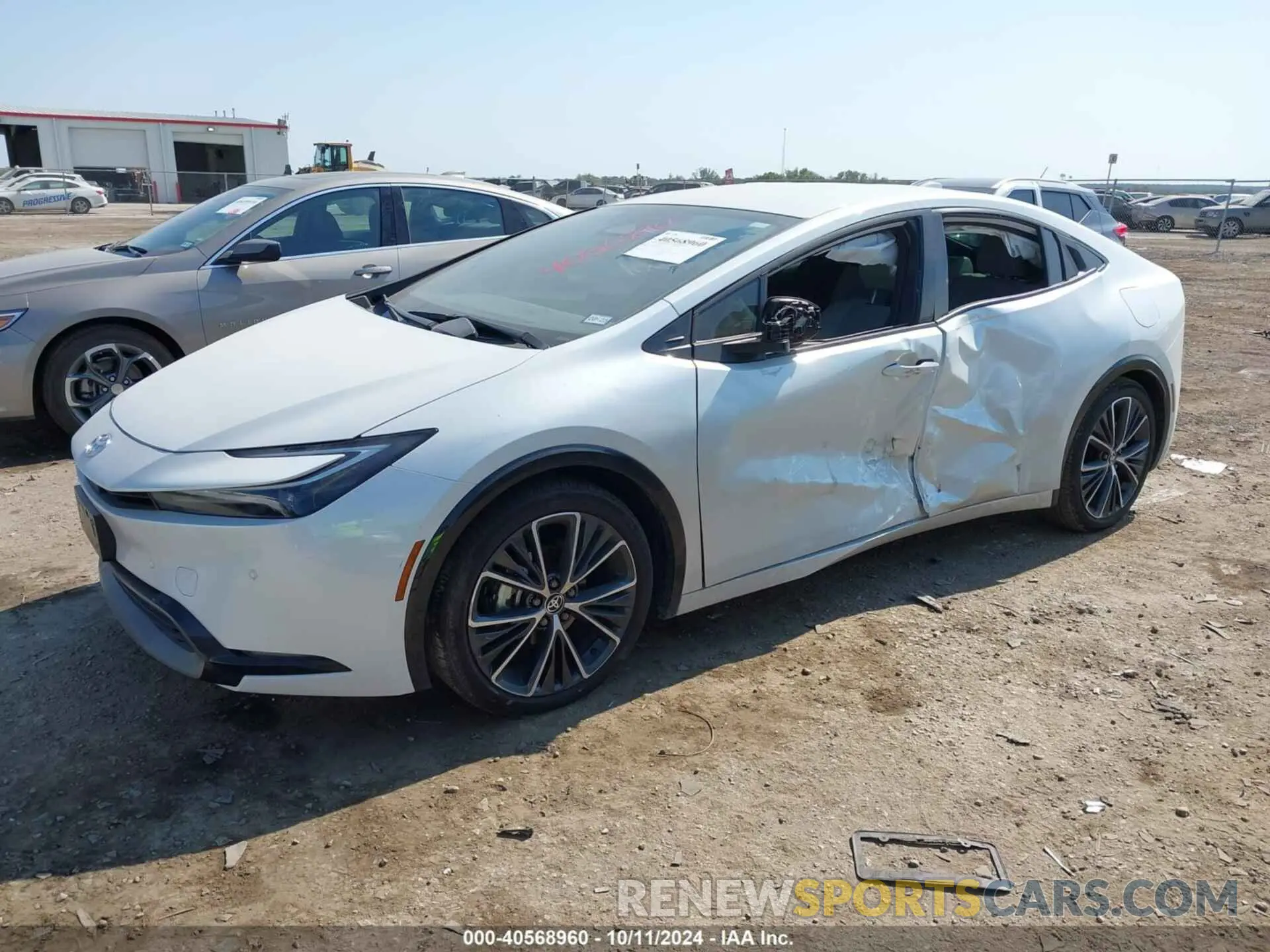 2 Photograph of a damaged car JTDACAAU6P3011869 TOYOTA PRIUS 2023