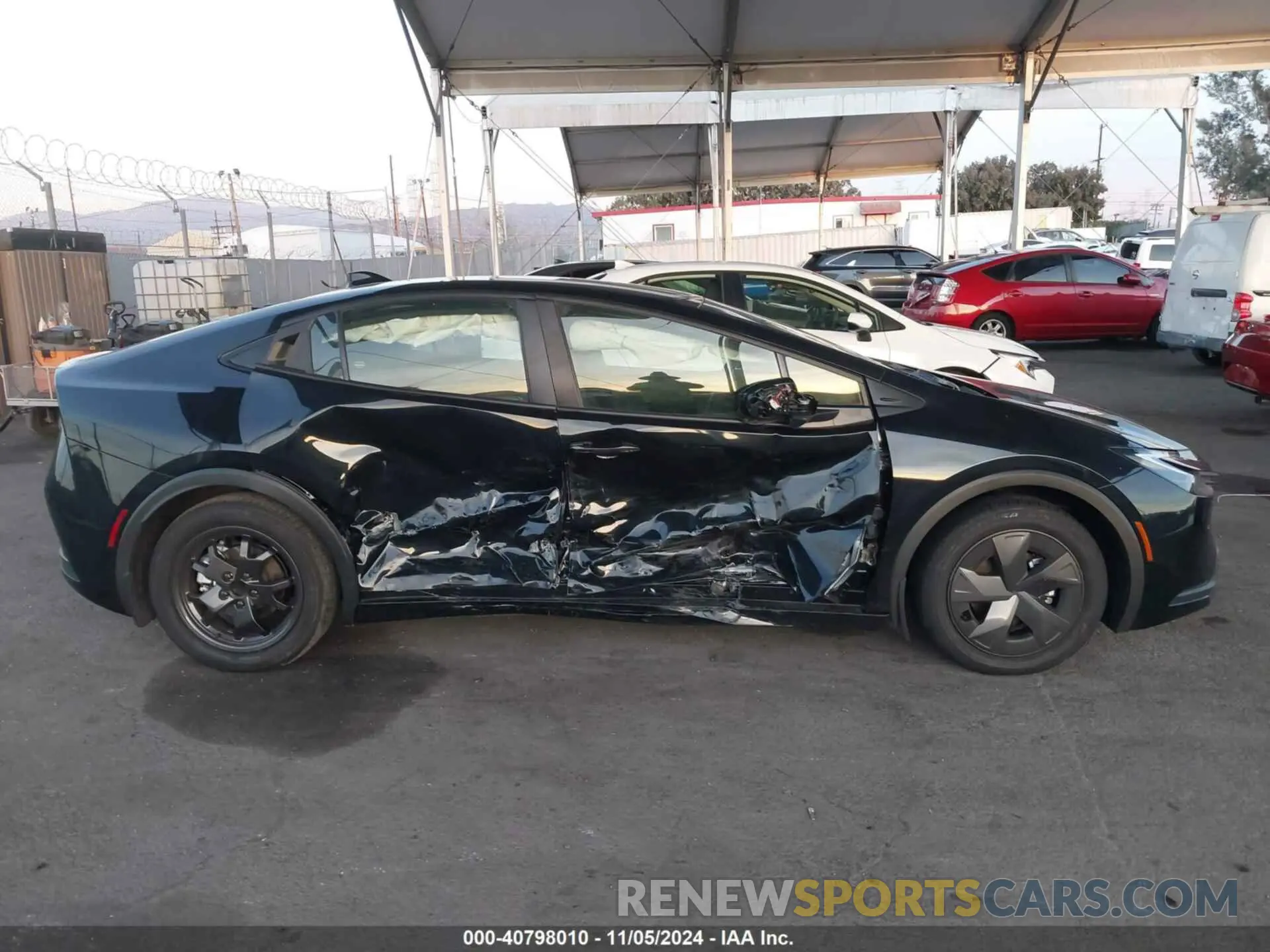 13 Photograph of a damaged car JTDACAAU7P3012156 TOYOTA PRIUS 2023