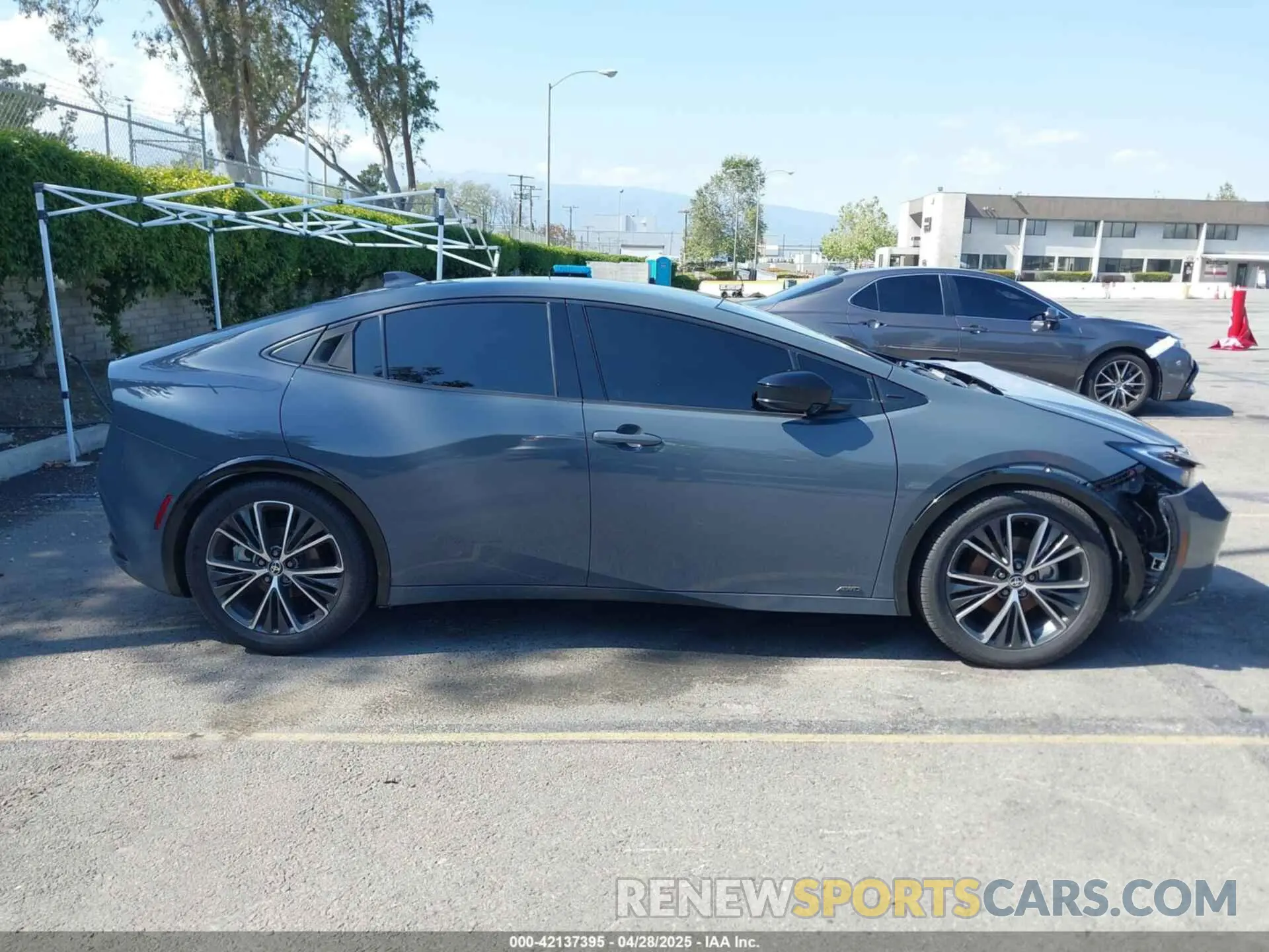 13 Фотография поврежденного автомобиля JTDADABU6P3001399 TOYOTA PRIUS 2023