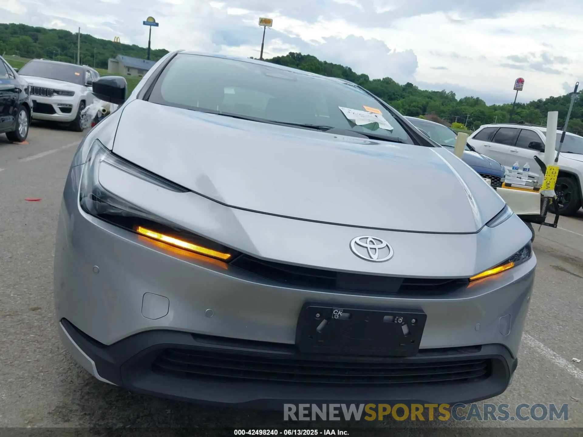 12 Фотография поврежденного автомобиля JTDACAAU2R3035699 TOYOTA PRIUS 2024