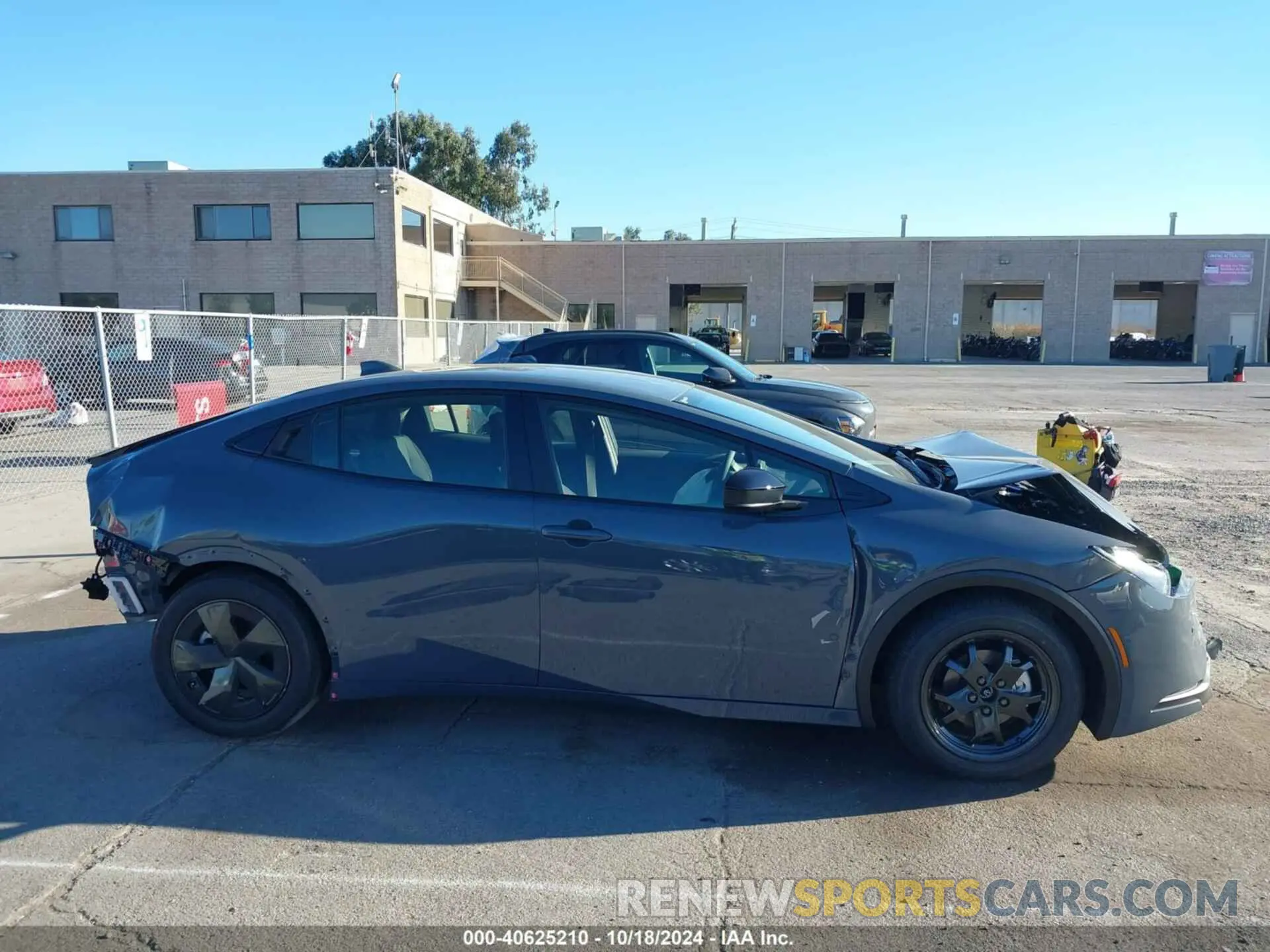 14 Photograph of a damaged car JTDACAAUXR3037135 TOYOTA PRIUS 2024