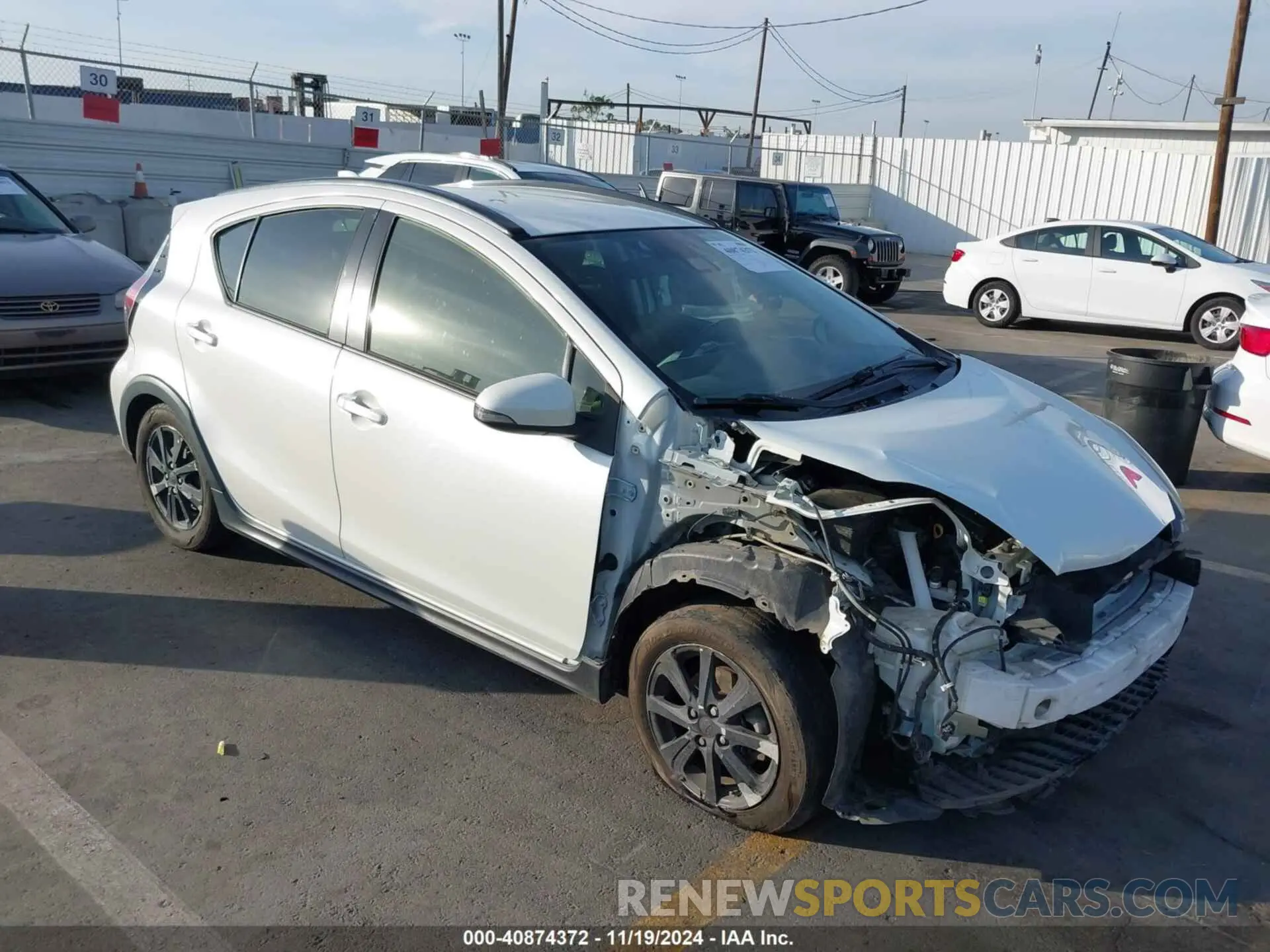 1 Photograph of a damaged car JTDKDTB39K1622874 TOYOTA PRIUS C 2019