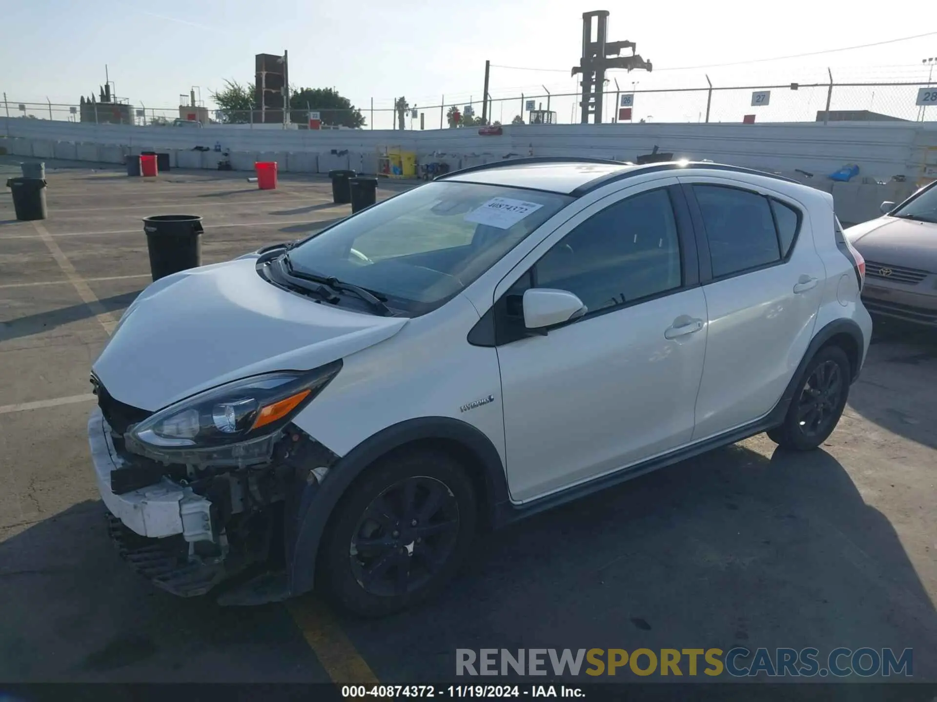 2 Photograph of a damaged car JTDKDTB39K1622874 TOYOTA PRIUS C 2019