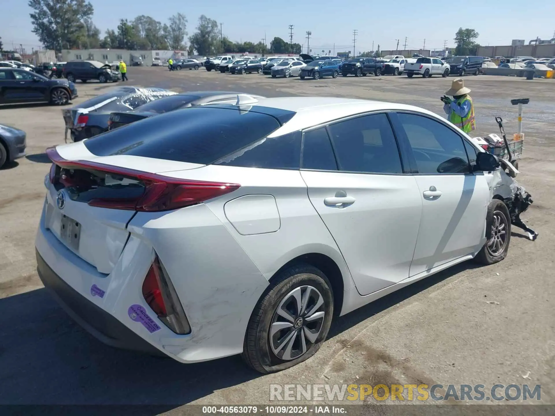 4 Photograph of a damaged car JTDKARFP9K3108231 TOYOTA PRIUS PRIME 2019
