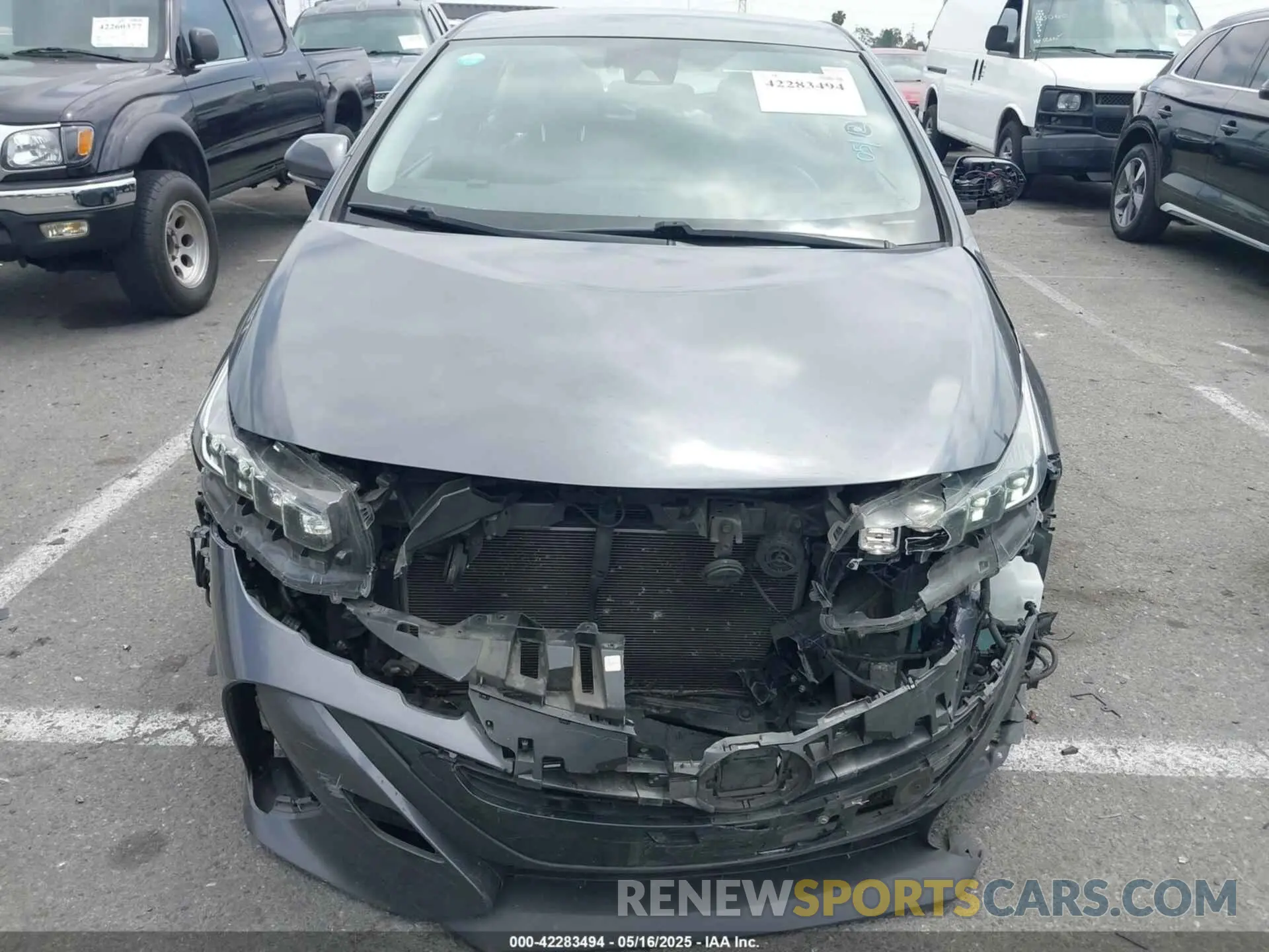 12 Photograph of a damaged car JTDKAMFP0M3193305 TOYOTA PRIUS PRIME 2021