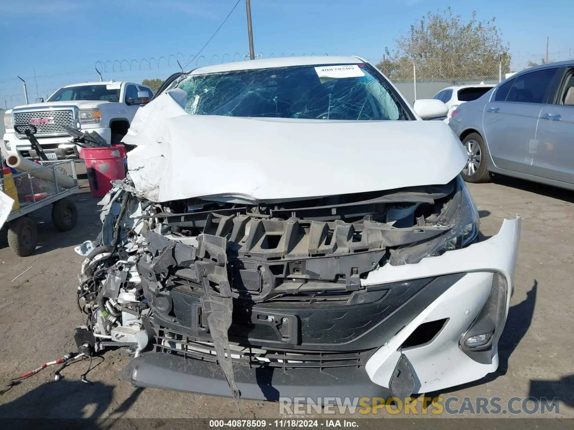 12 Photograph of a damaged car JTDKAMFP6M3166318 TOYOTA PRIUS PRIME 2021