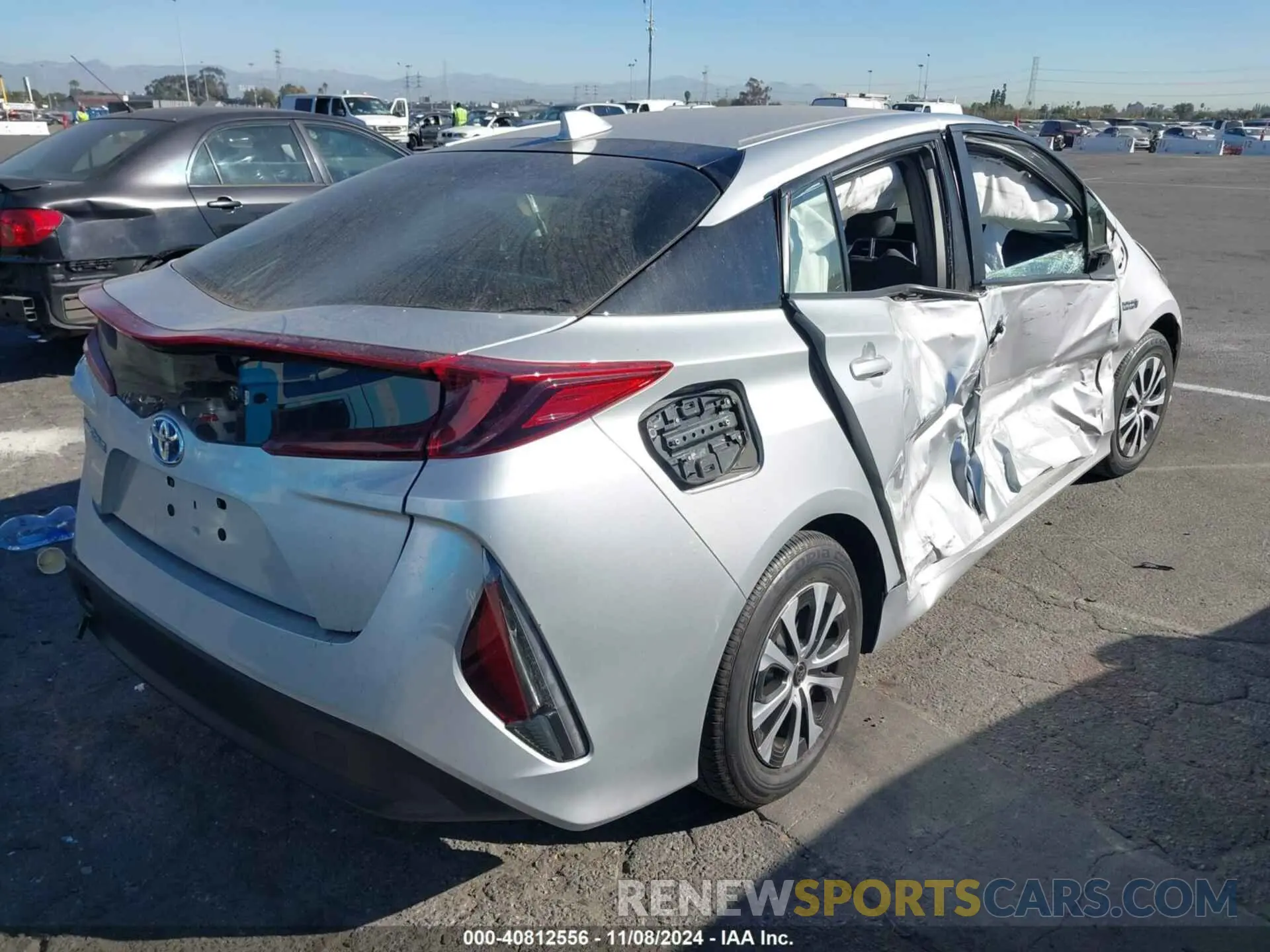 4 Photograph of a damaged car JTDKAMFP7M3175450 TOYOTA PRIUS PRIME 2021