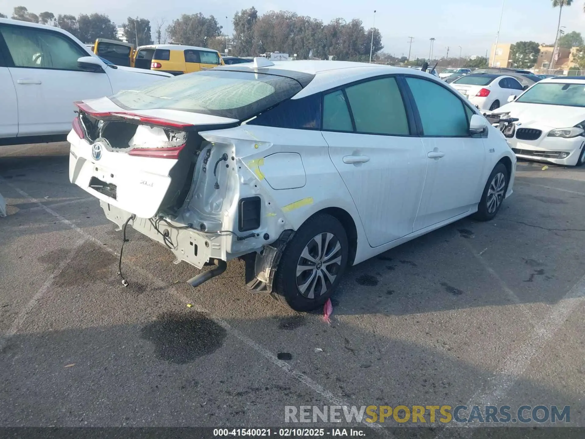 4 Photograph of a damaged car JTDKAMFP7M3193401 TOYOTA PRIUS PRIME 2021