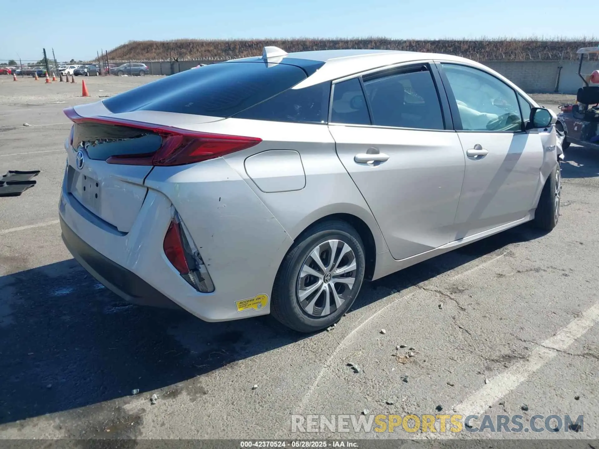 4 Photograph of a damaged car JTDKAMFP0N3218382 TOYOTA PRIUS PRIME 2022