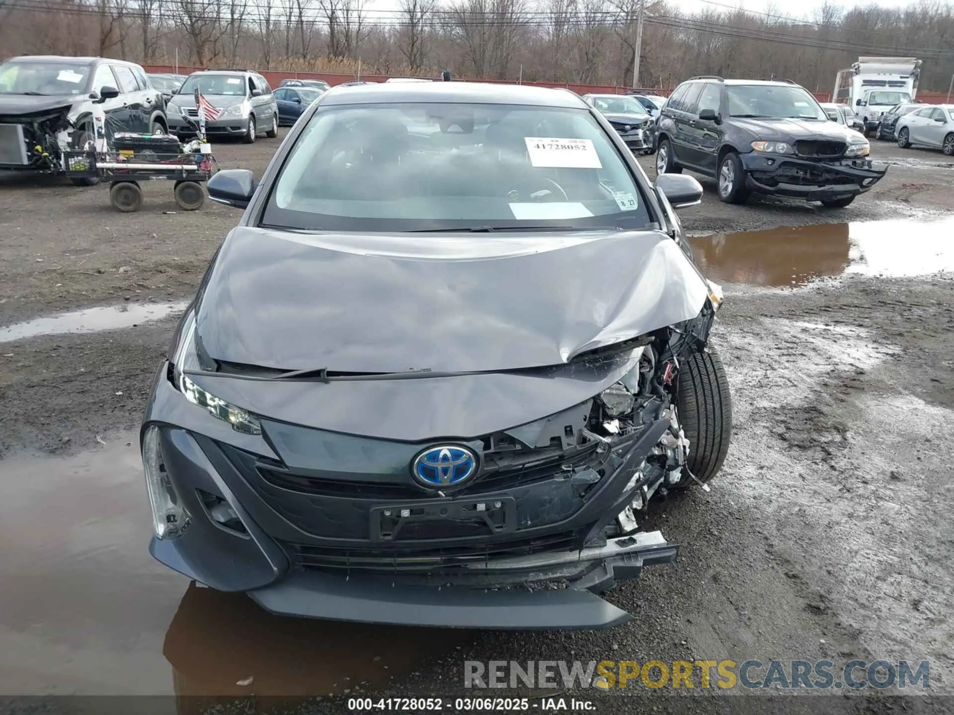 12 Photograph of a damaged car JTDKAMFP1N3218374 TOYOTA PRIUS PRIME 2022