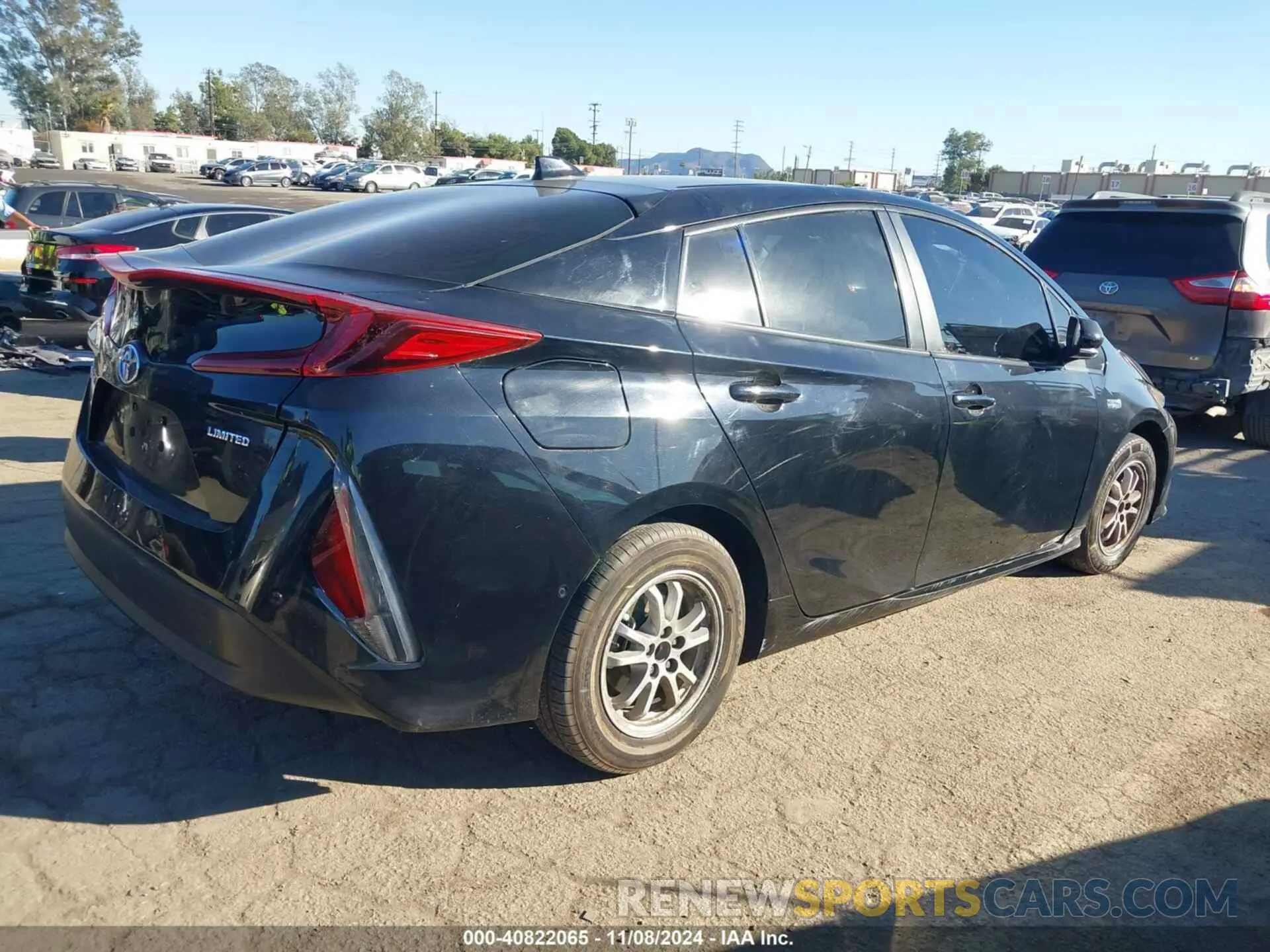 4 Photograph of a damaged car JTDKAMFP5N3225781 TOYOTA PRIUS PRIME 2022