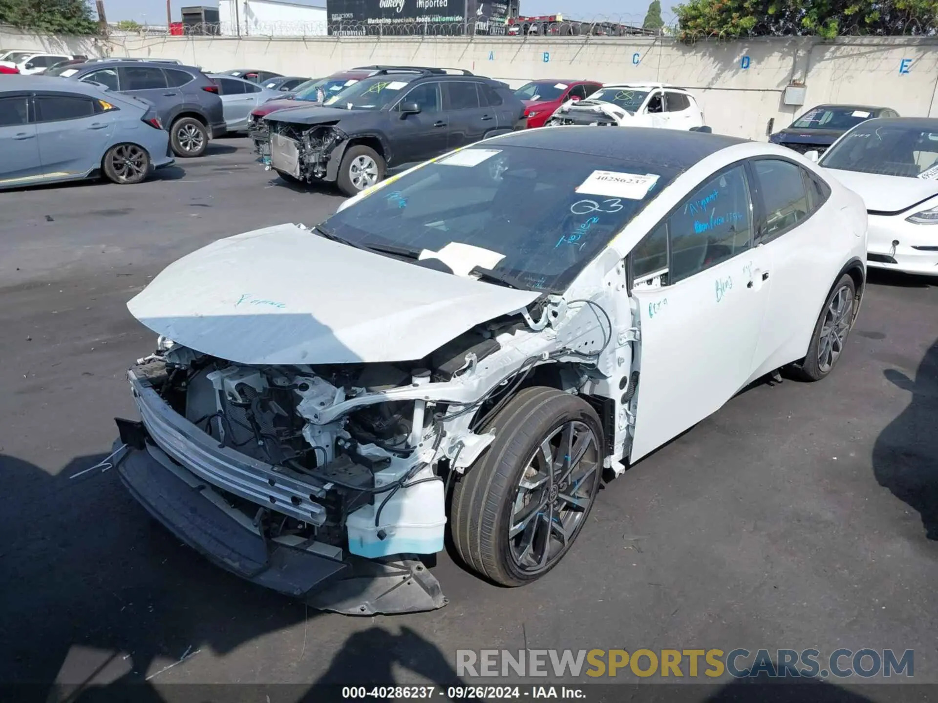2 Фотография поврежденного автомобиля JTDACACU2P3000896 TOYOTA PRIUS PRIME 2023