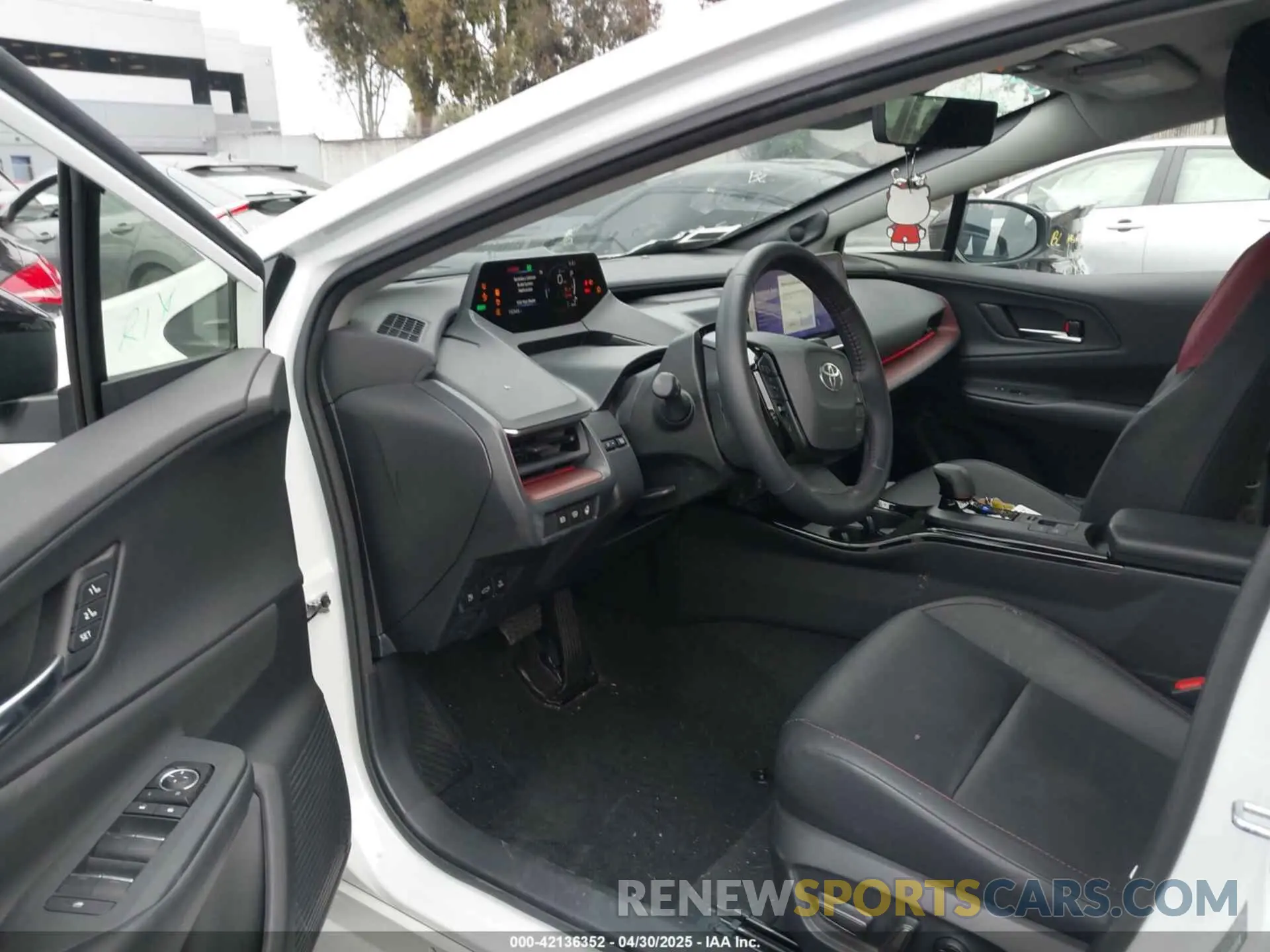 19 Photograph of a damaged car JTDACACU5P3000181 TOYOTA PRIUS PRIME 2023