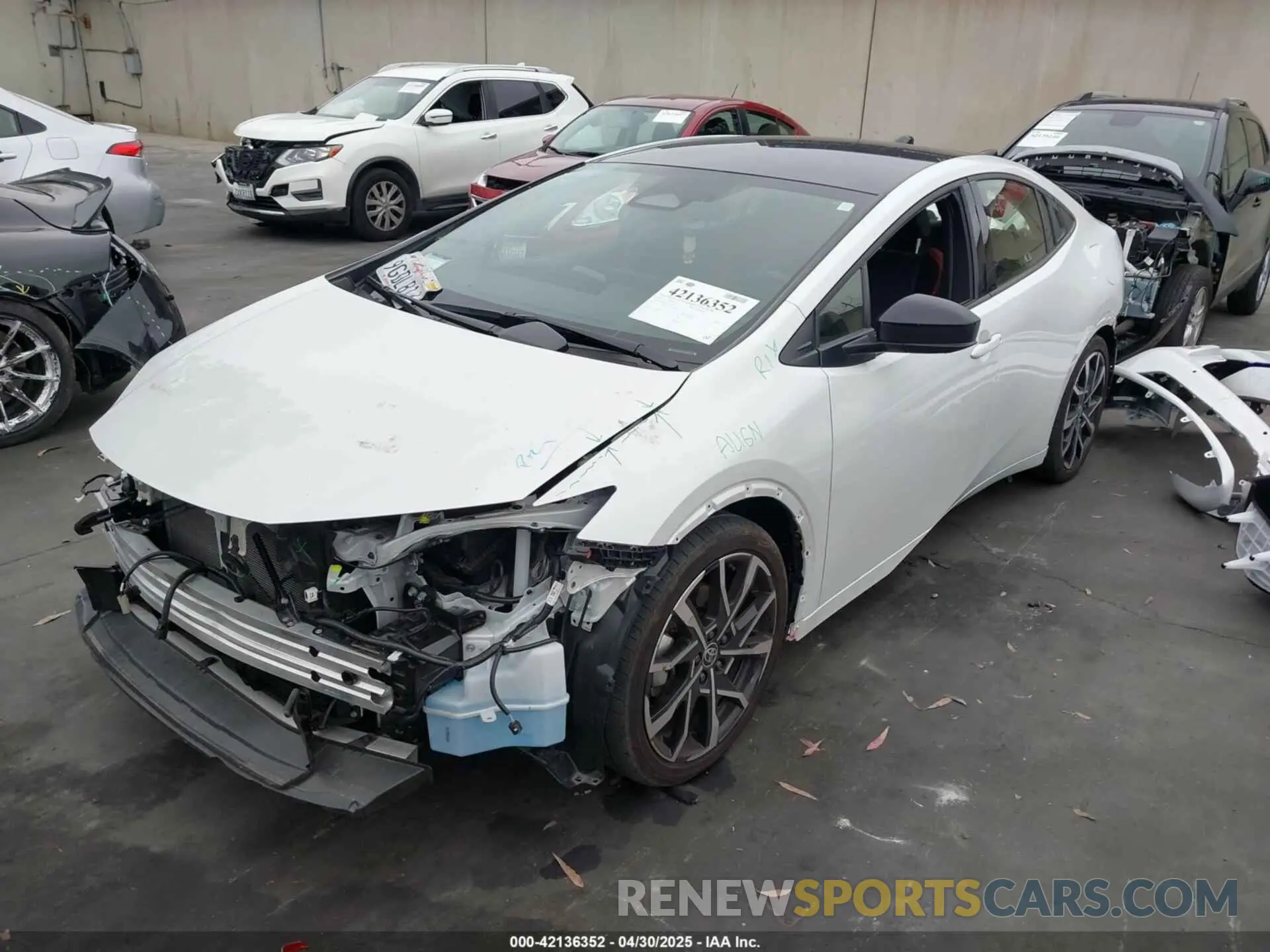 2 Photograph of a damaged car JTDACACU5P3000181 TOYOTA PRIUS PRIME 2023
