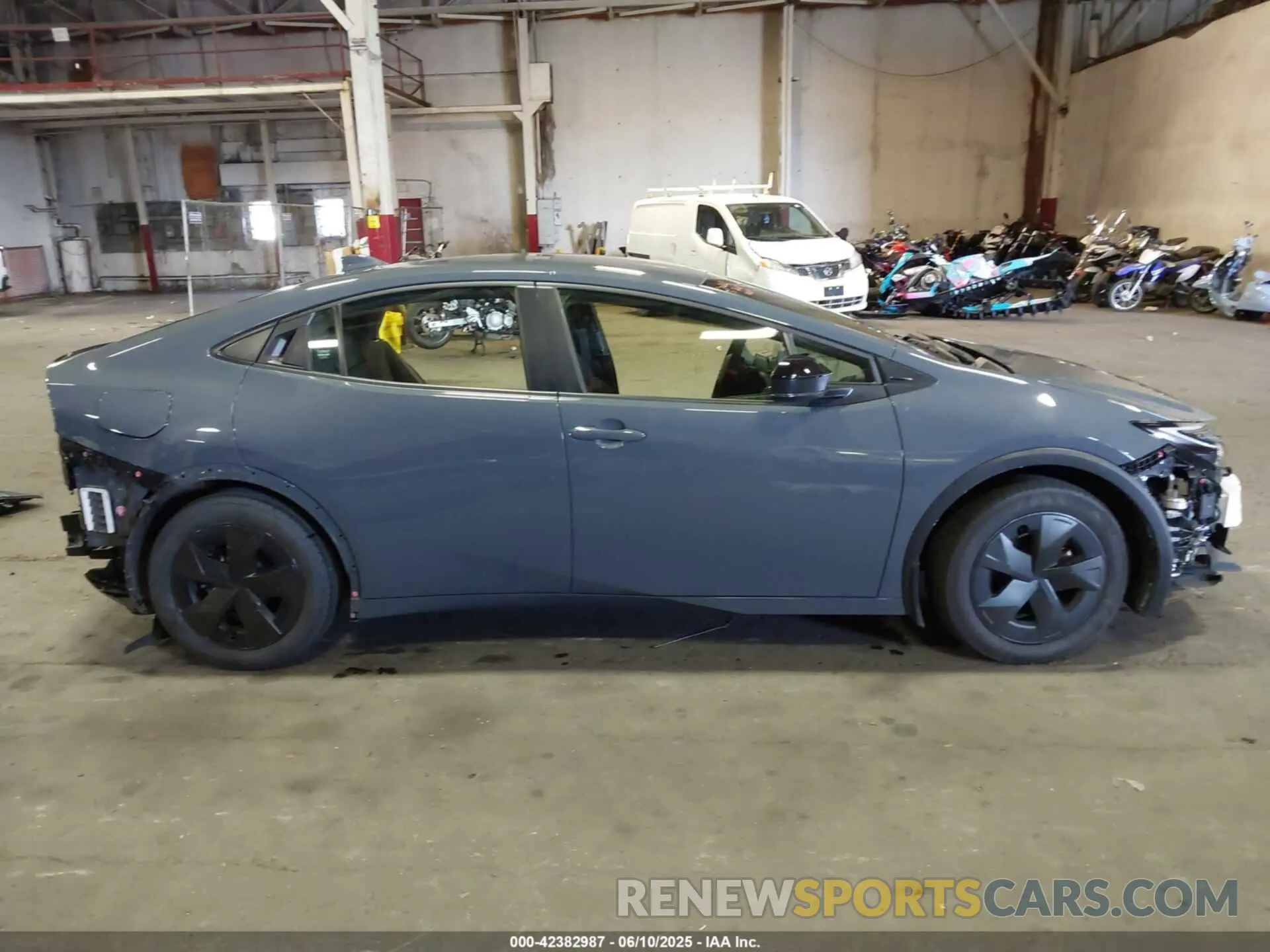 14 Photograph of a damaged car JTDACACU0R3022382 TOYOTA PRIUS PRIME 2024