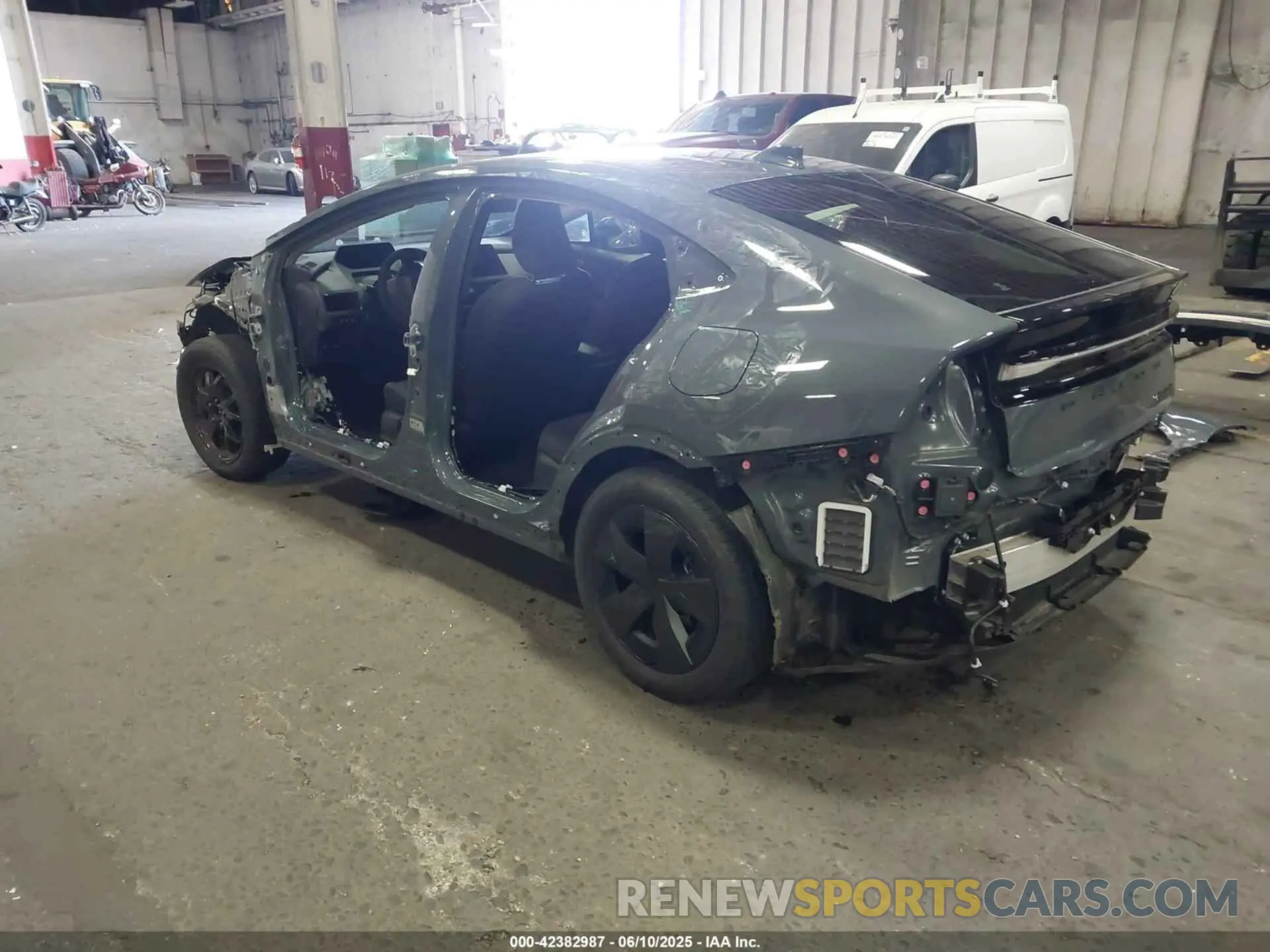3 Photograph of a damaged car JTDACACU0R3022382 TOYOTA PRIUS PRIME 2024