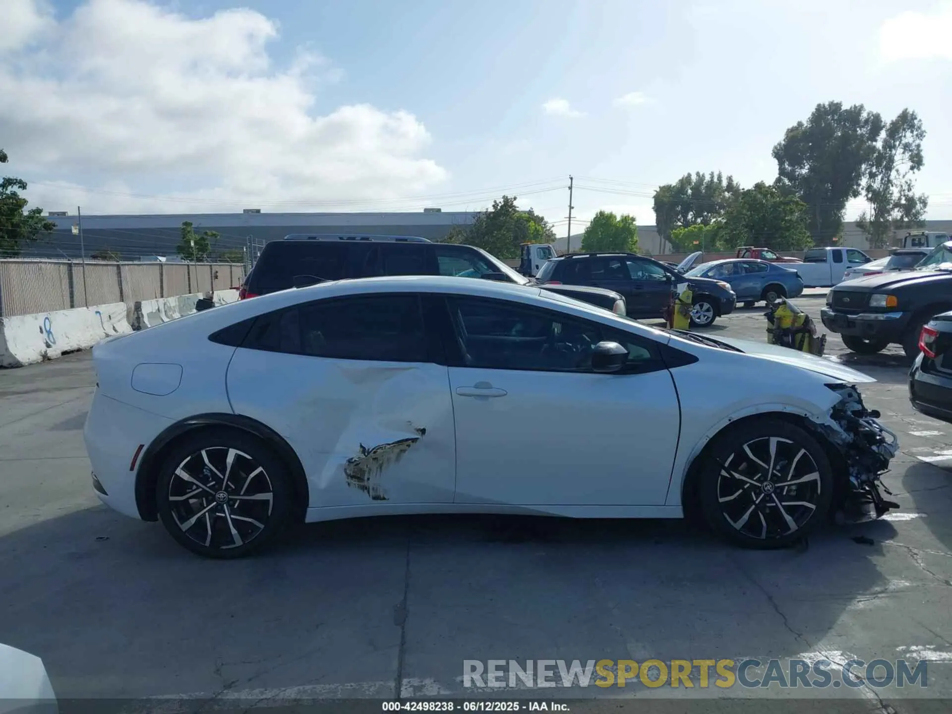 14 Photograph of a damaged car JTDACACU9R3023174 TOYOTA PRIUS PRIME 2024