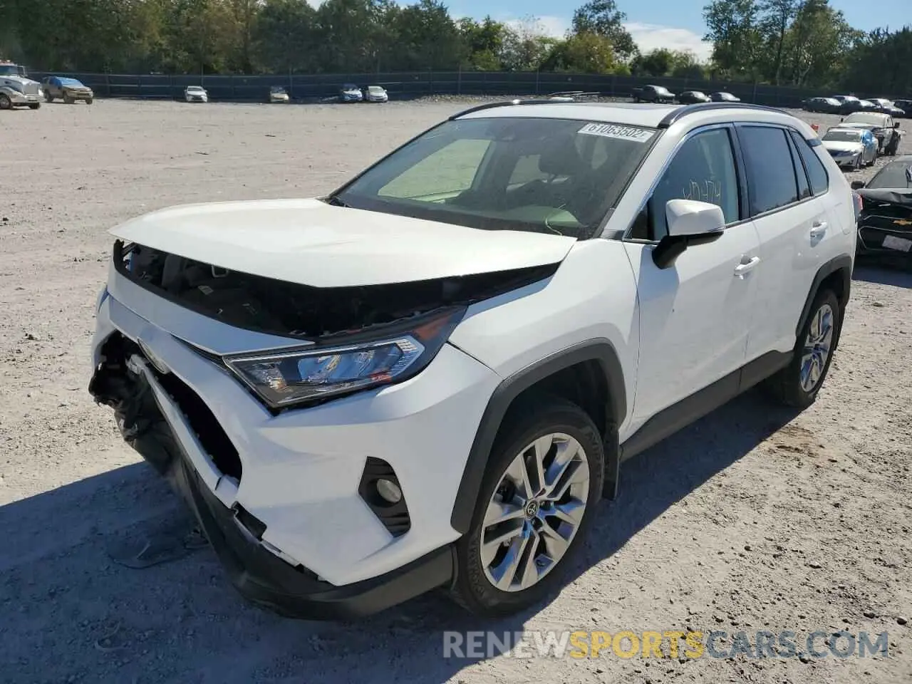 2 Фотография поврежденного автомобиля JTMA1RFV0KD006997 TOYOTA RAV4 2019