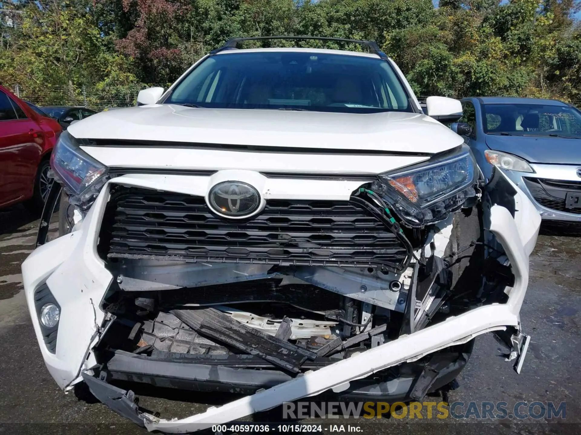 12 Photograph of a damaged car JTMA1RFV1KD009827 TOYOTA RAV4 2019