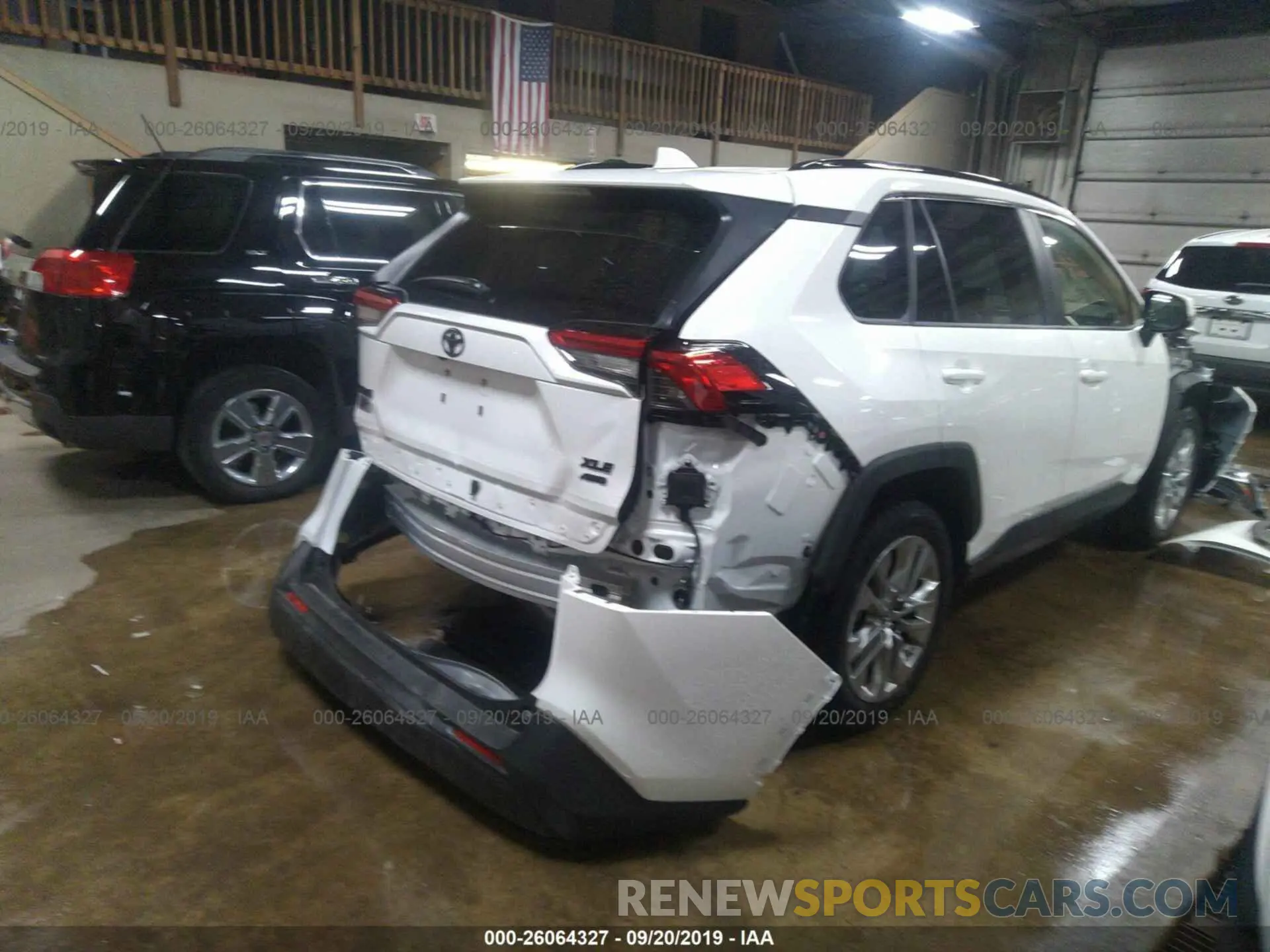 4 Photograph of a damaged car JTMA1RFV3KD026354 TOYOTA RAV4 2019