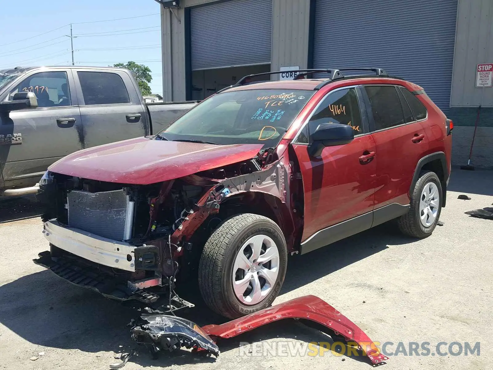 2 Photograph of a damaged car JTMF1RFV2KJ018897 TOYOTA RAV4 2019