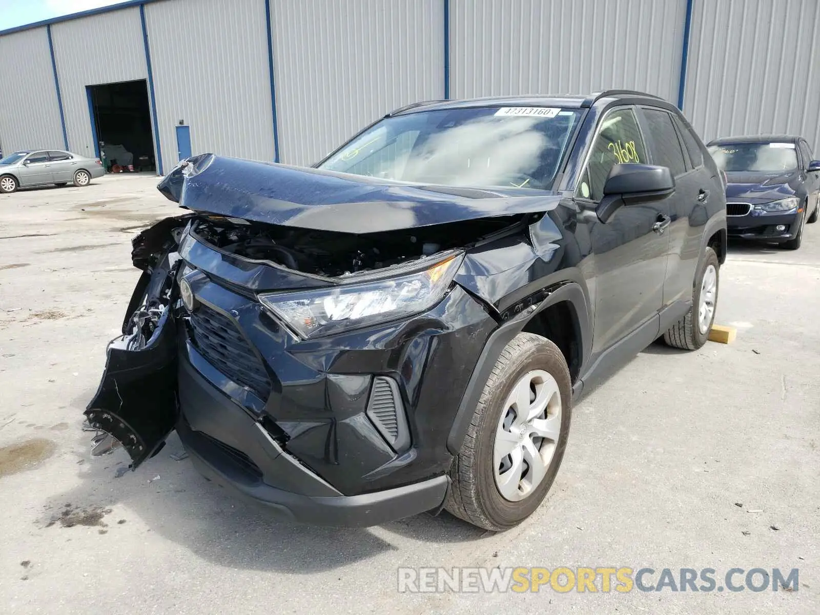 2 Photograph of a damaged car JTMH1RFV1KJ007317 TOYOTA RAV4 2019