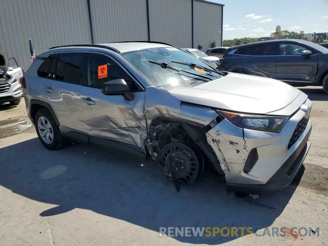 4 Photograph of a damaged car JTMH1RFV1KJ015272 TOYOTA RAV4 2019