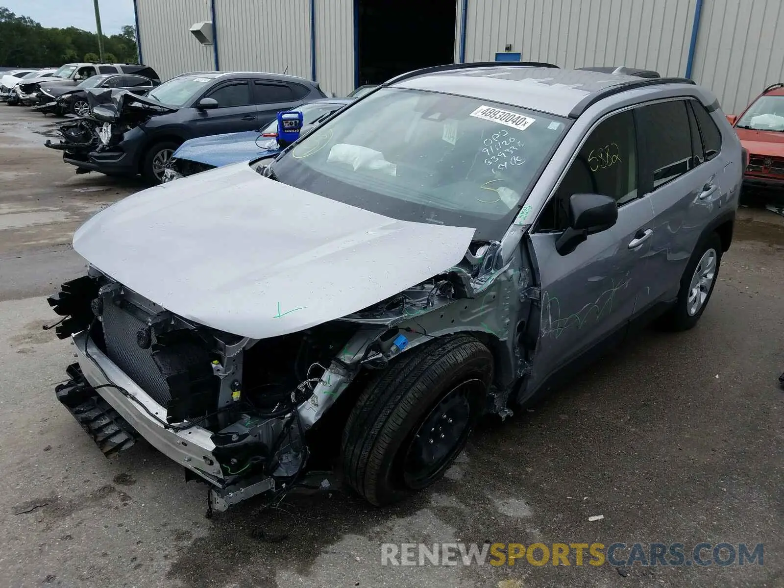 2 Photograph of a damaged car JTMH1RFV8KD032603 TOYOTA RAV4 2019