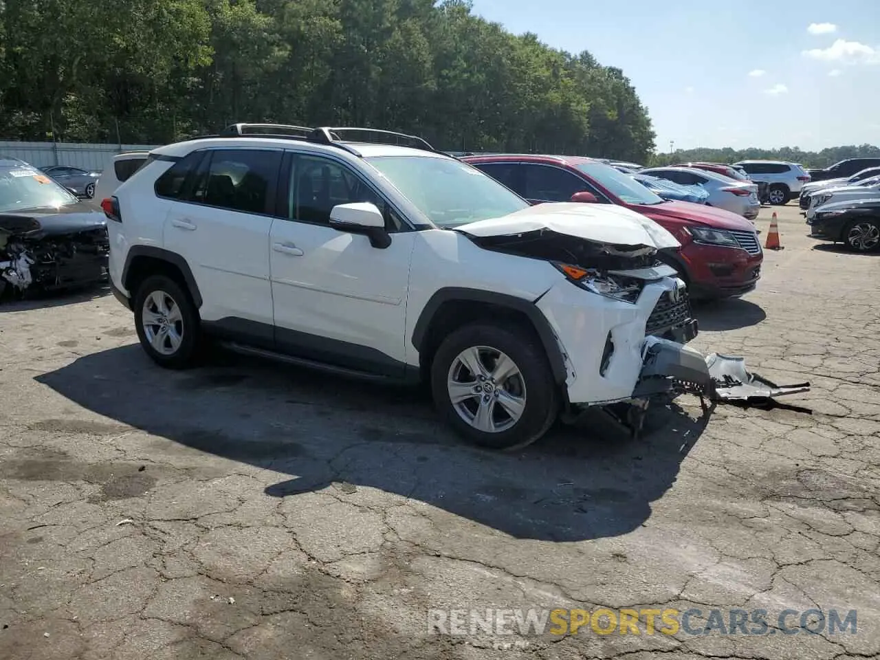 4 Photograph of a damaged car JTMP1RFV4KD046008 TOYOTA RAV4 2019