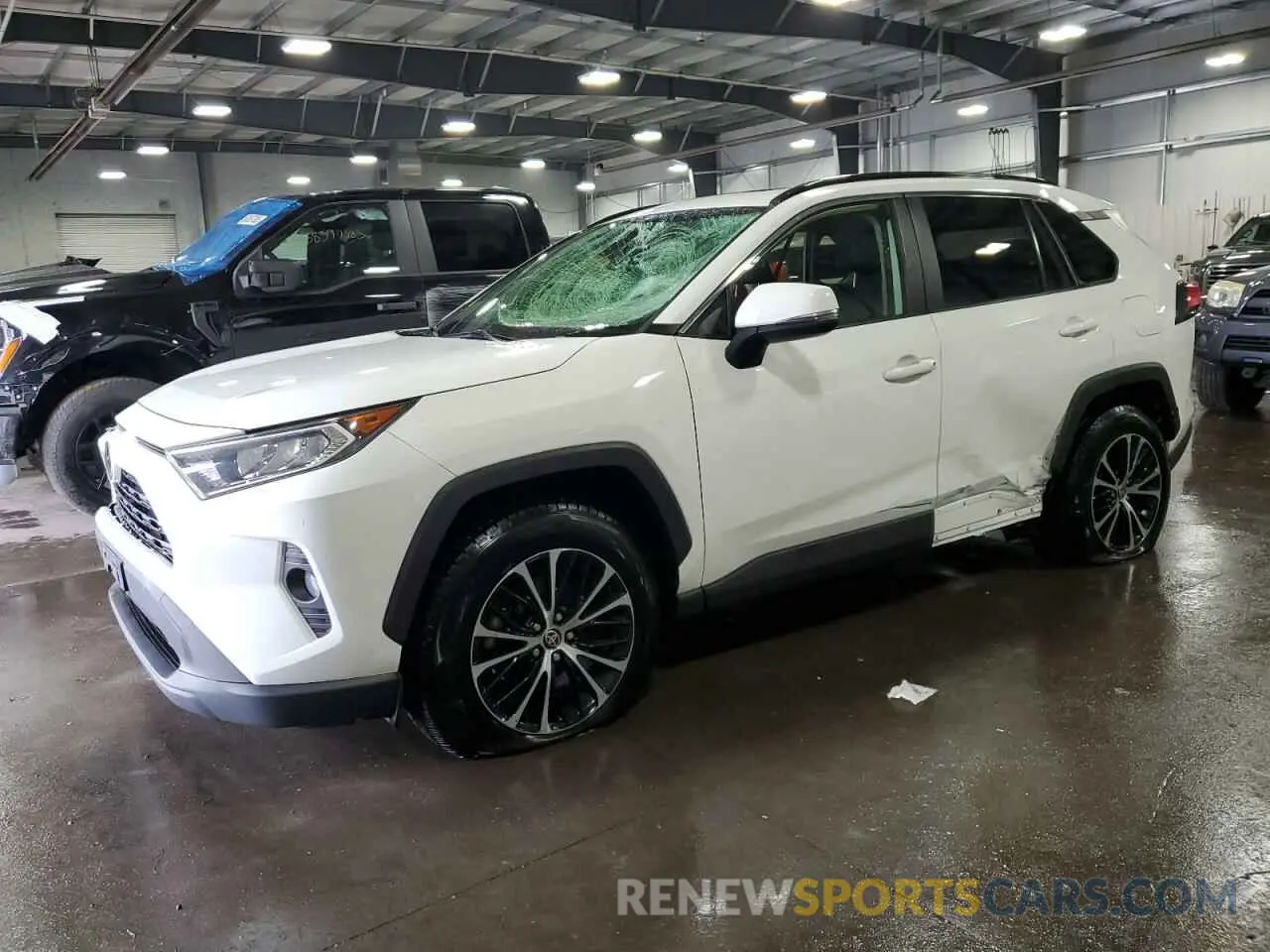 1 Photograph of a damaged car JTMP1RFV6KD518659 TOYOTA RAV4 2019