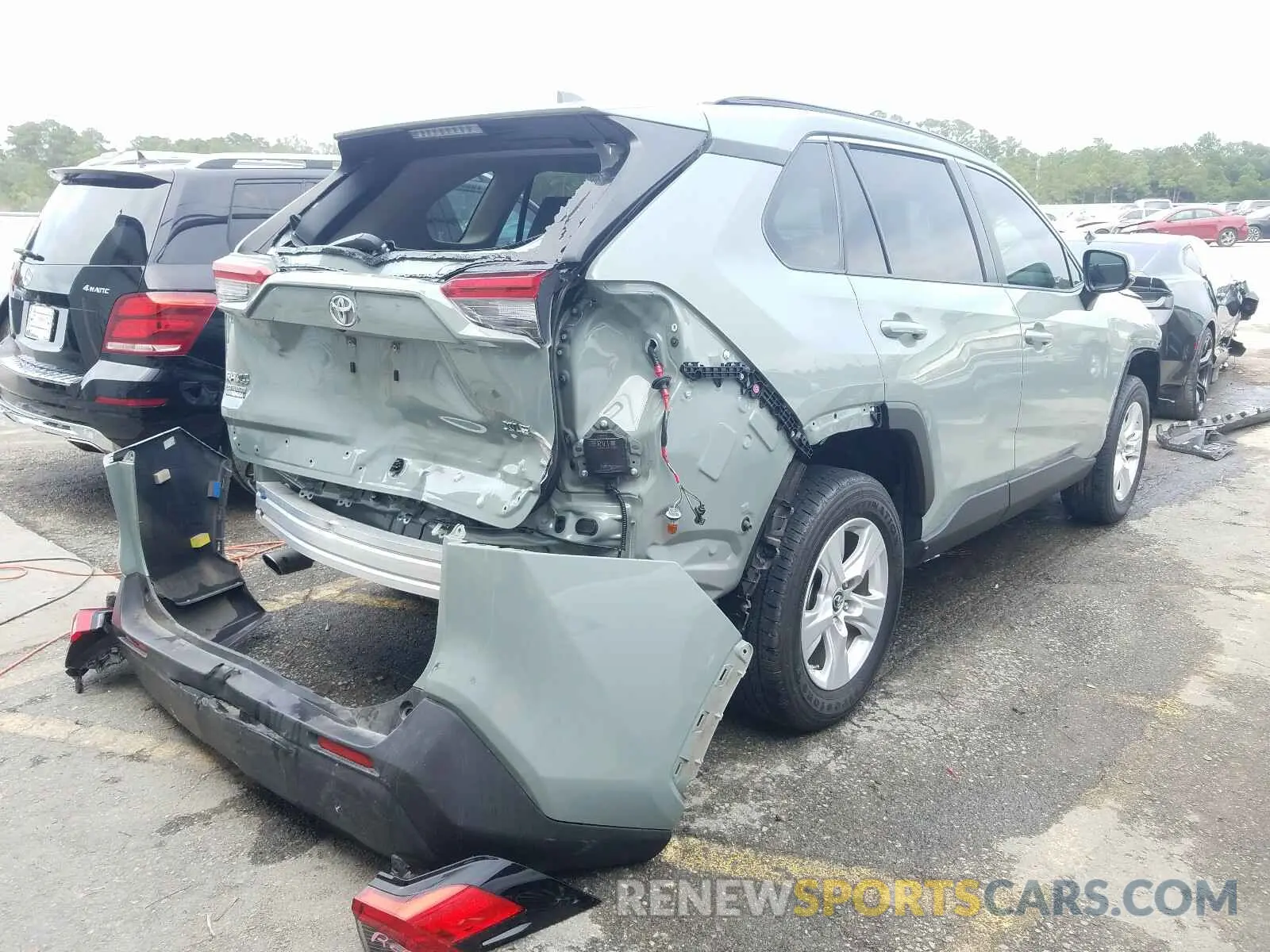 4 Photograph of a damaged car JTMW1RFV3KD509302 TOYOTA RAV4 2019