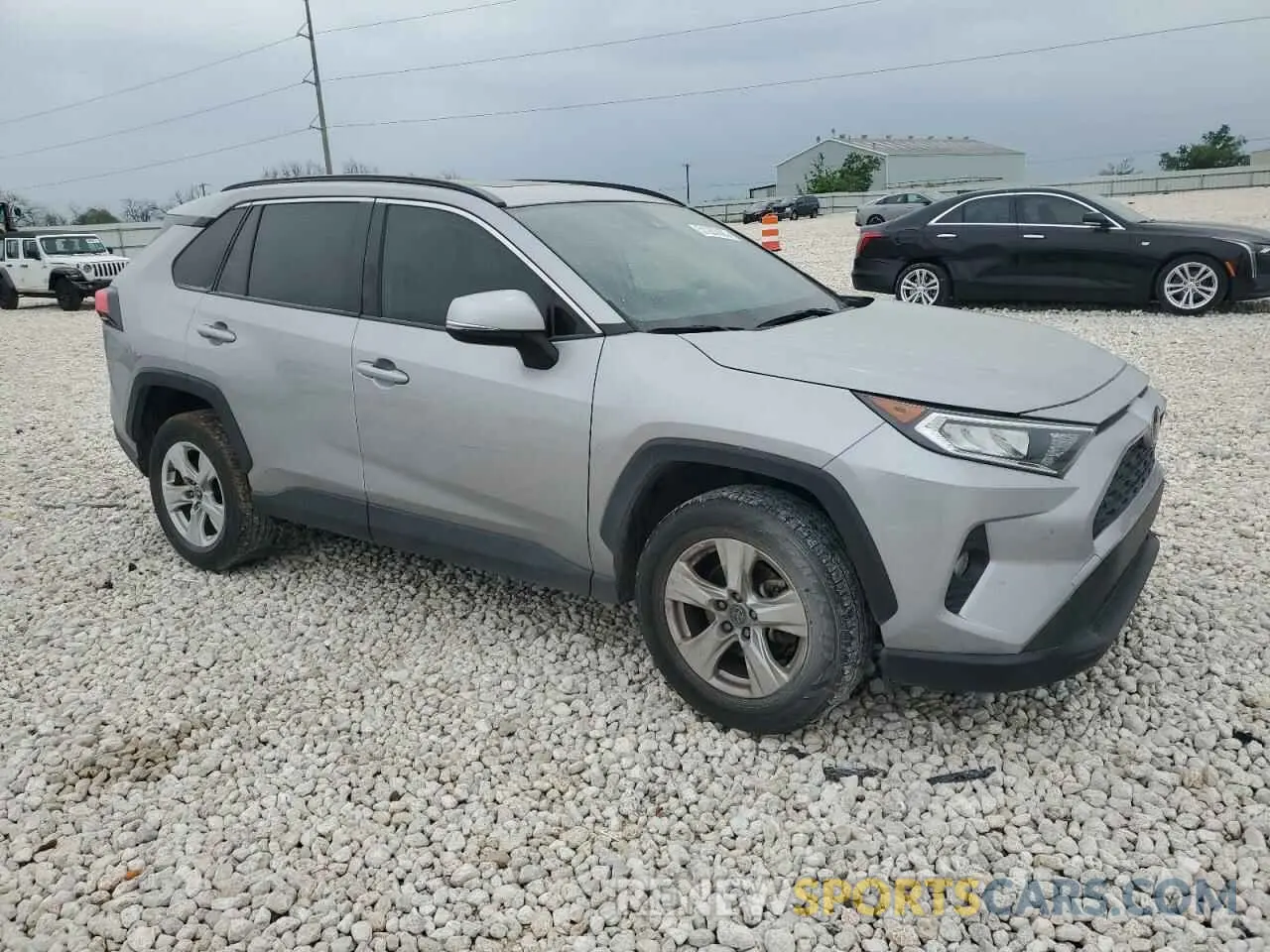 4 Photograph of a damaged car JTMW1RFVXKD500418 TOYOTA RAV4 2019
