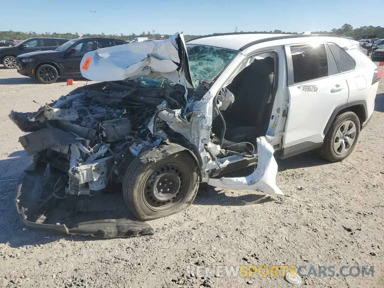 1 Photograph of a damaged car 2T3H1RFVXLC046749 TOYOTA RAV4 2020