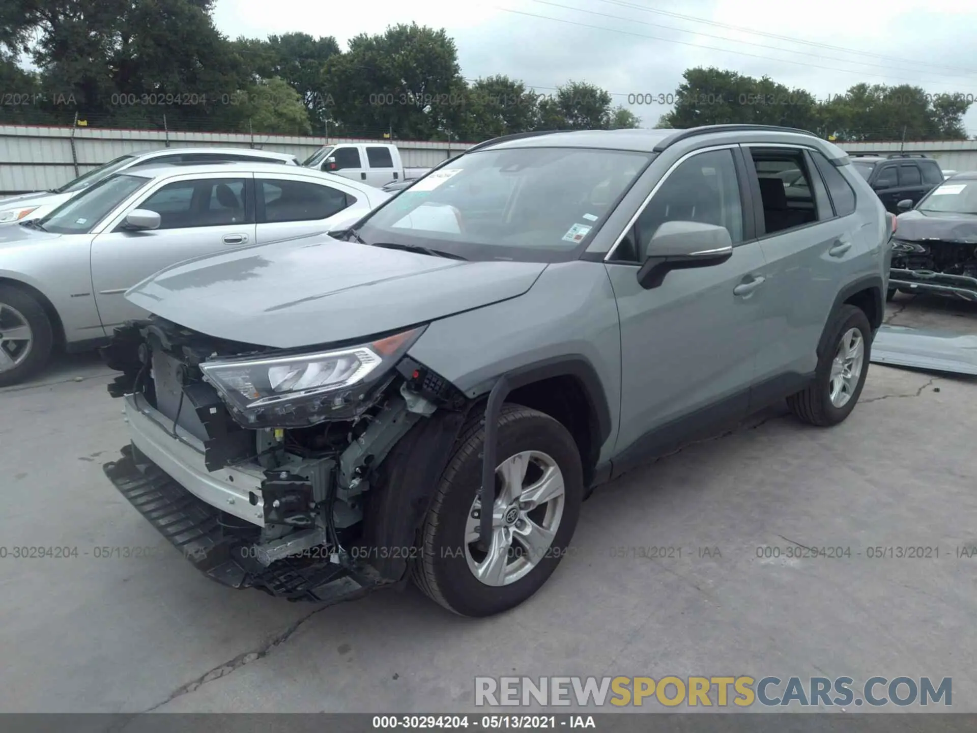 2 Photograph of a damaged car 2T3W1RFV4MW136860 TOYOTA RAV4 2021