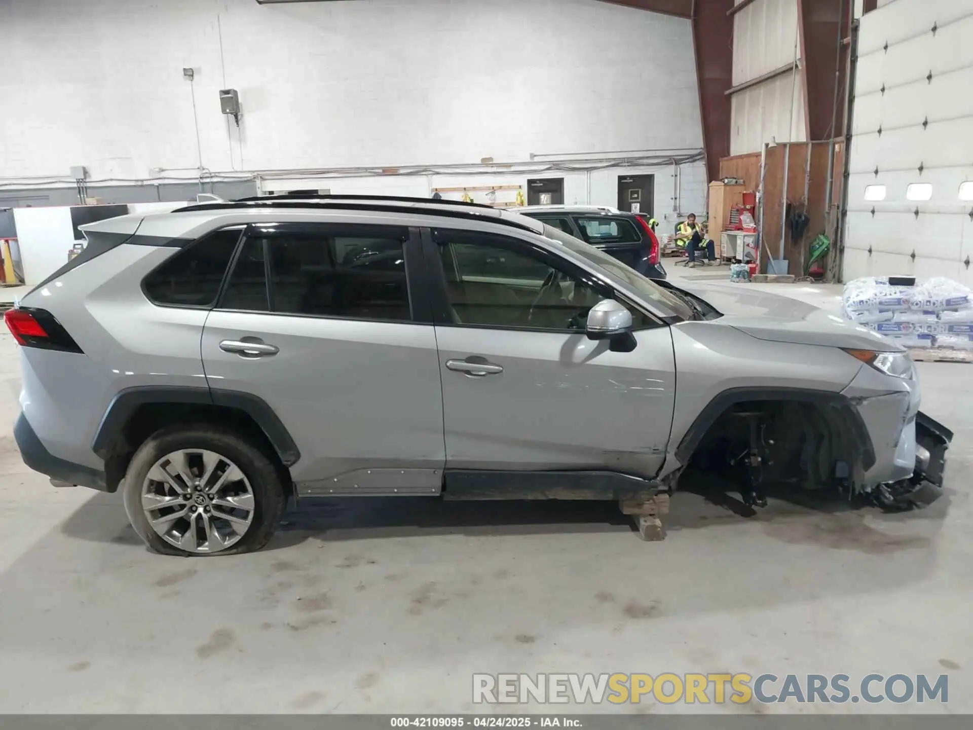 12 Photograph of a damaged car JTMA1RFV3MD075296 TOYOTA RAV4 2021