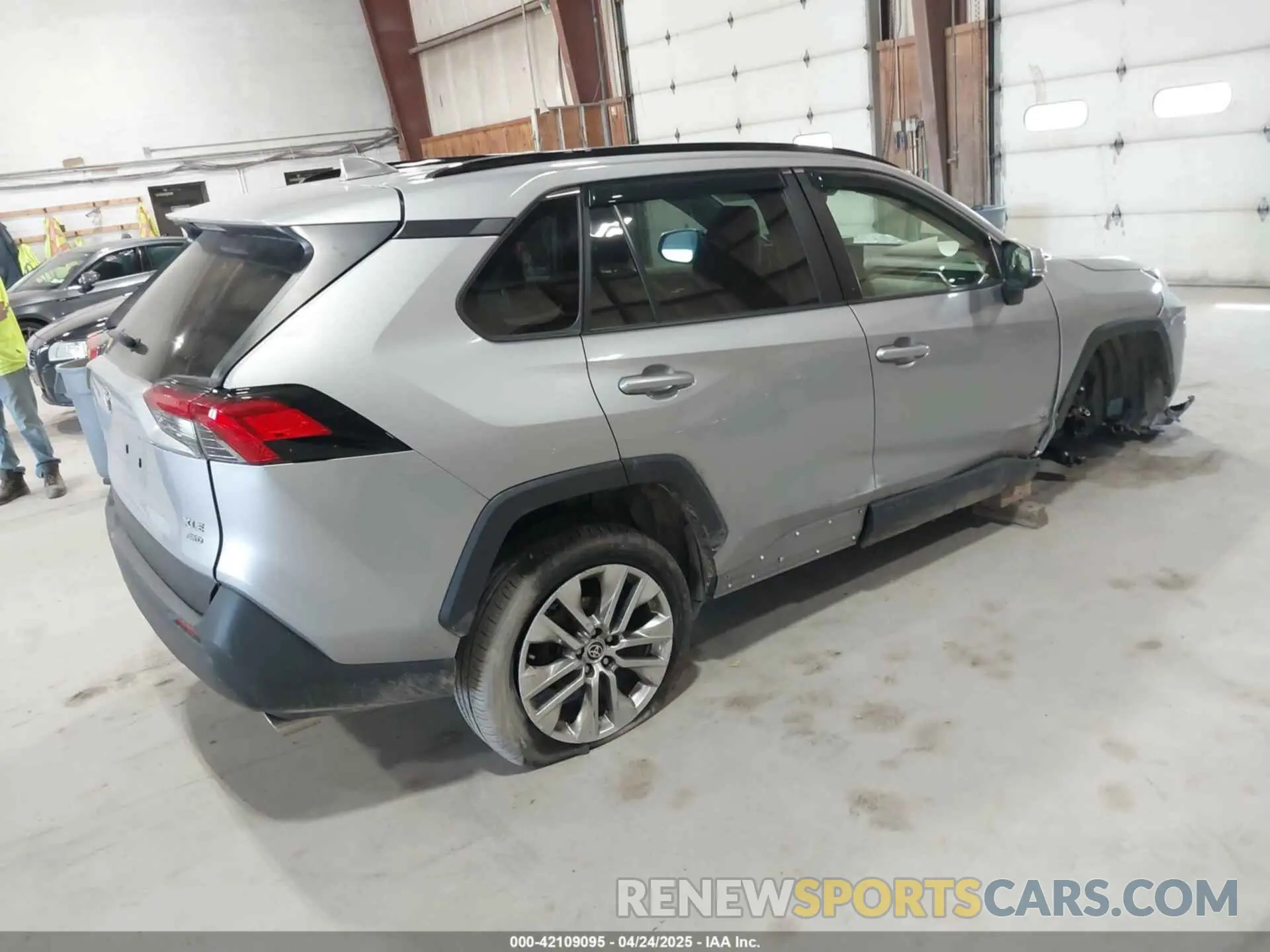 4 Photograph of a damaged car JTMA1RFV3MD075296 TOYOTA RAV4 2021