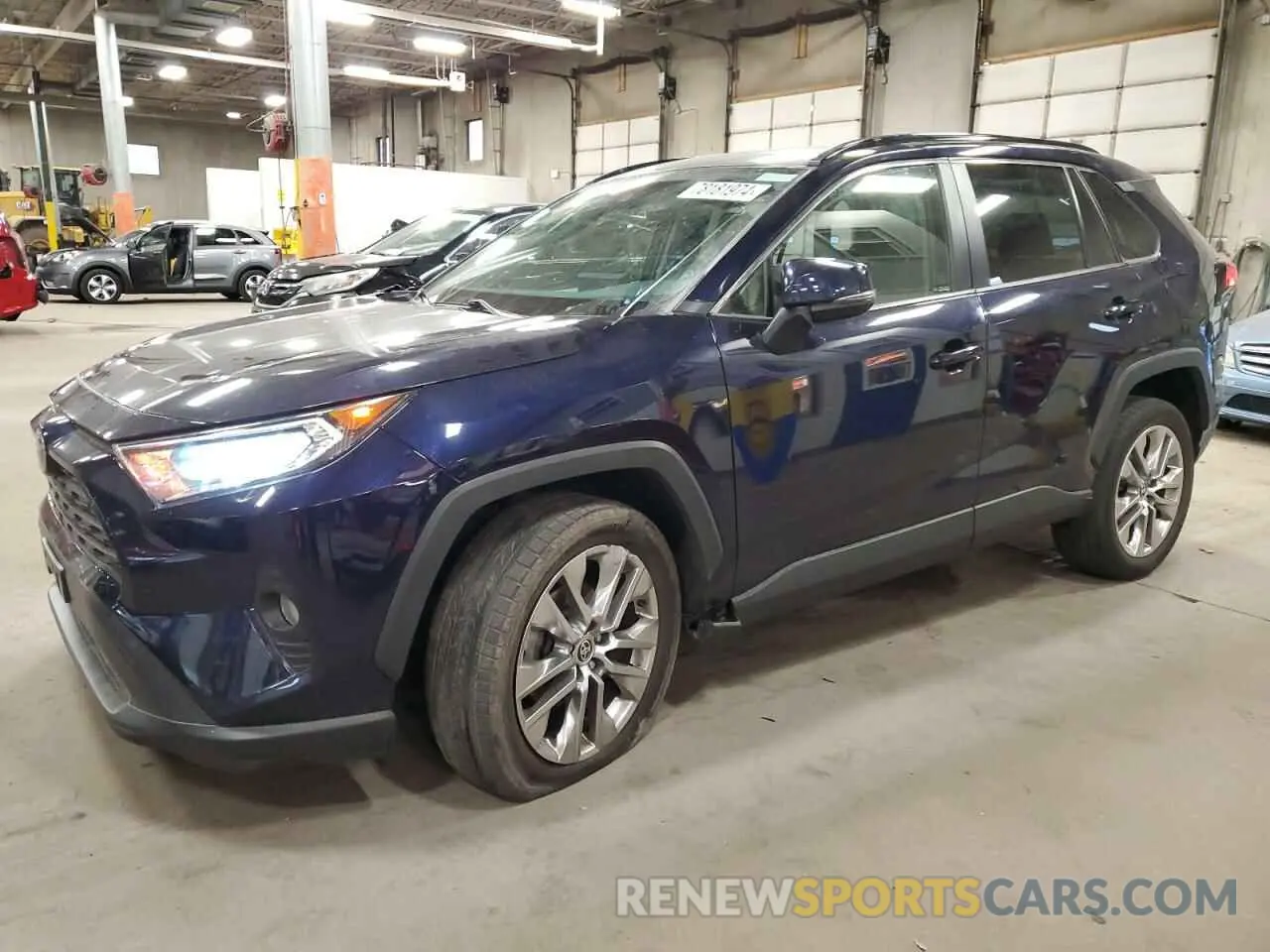 1 Photograph of a damaged car JTMA1RFVXMD070113 TOYOTA RAV4 2021