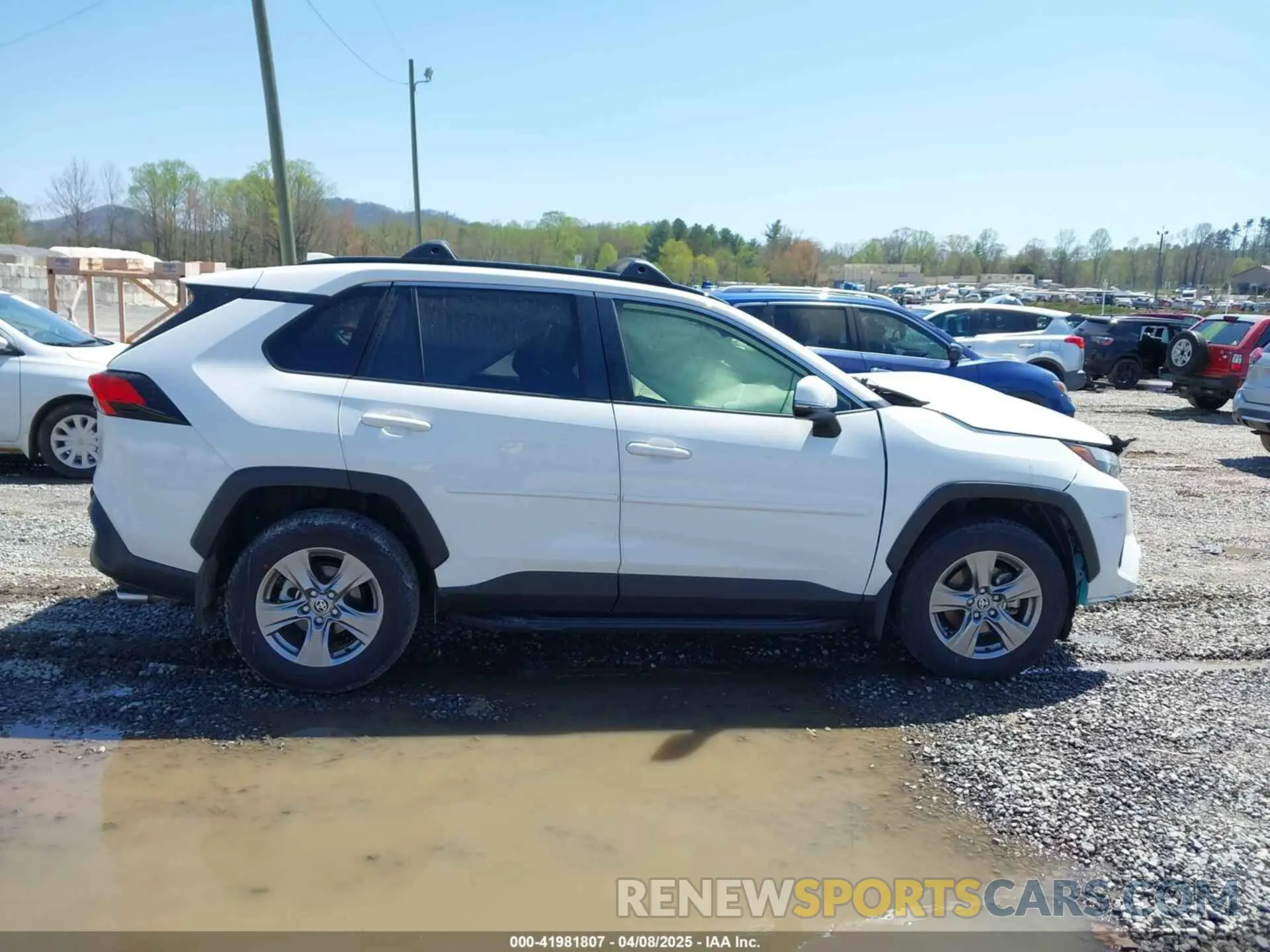 14 Photograph of a damaged car JTMP1RFV1PD093939 TOYOTA RAV4 2023