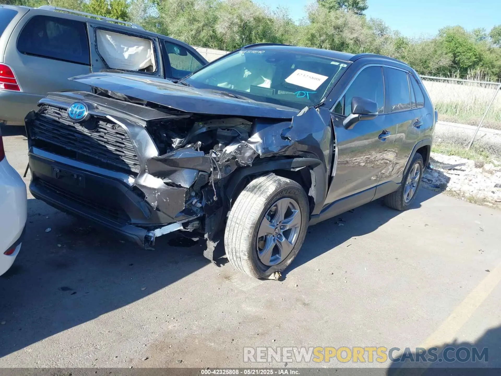 2 Photograph of a damaged car JTMRWRFVXND162537 TOYOTA RAV4 HYBRID 2022