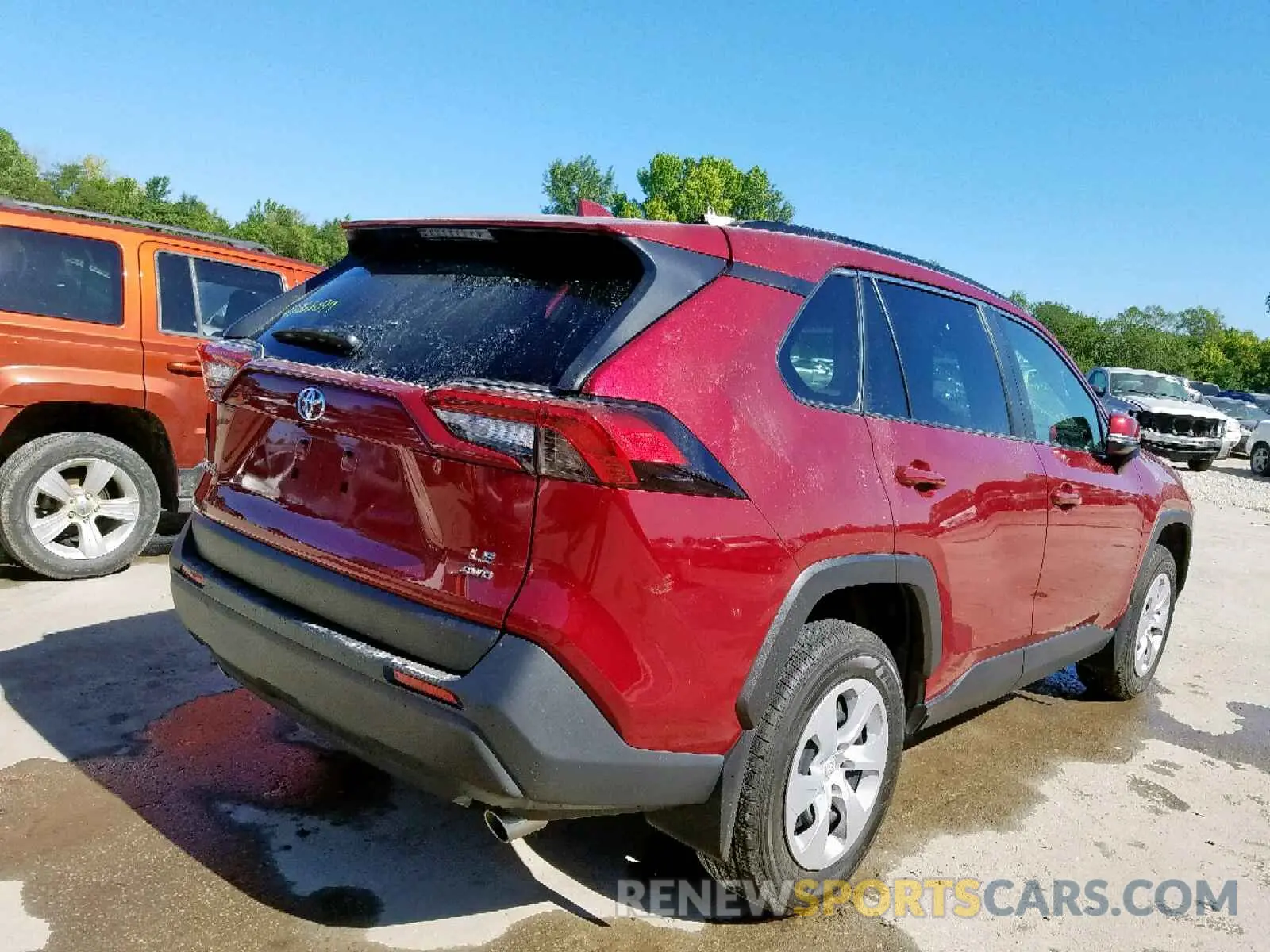 4 Photograph of a damaged car JTMG1RFV0KJ002105 TOYOTA RAV4 LE 2019
