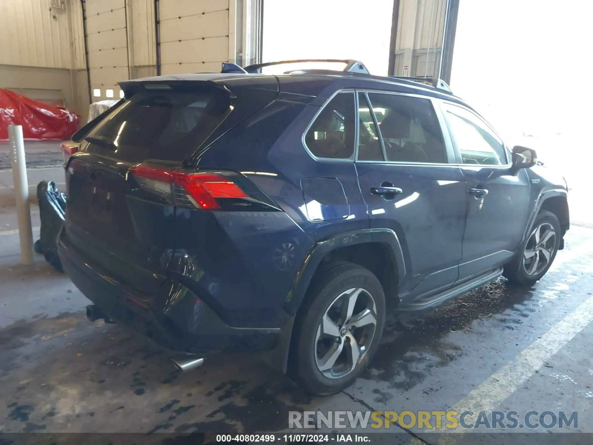 4 Photograph of a damaged car JTMAB3FV7PD116558 TOYOTA RAV4 PRIME 2023