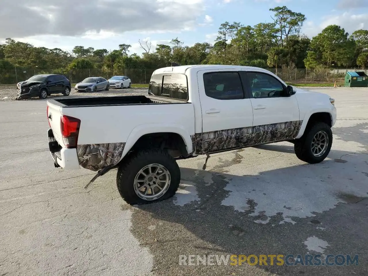 3 Photograph of a damaged car 3TMAZ5CN0KM080382 TOYOTA TACOMA 2019