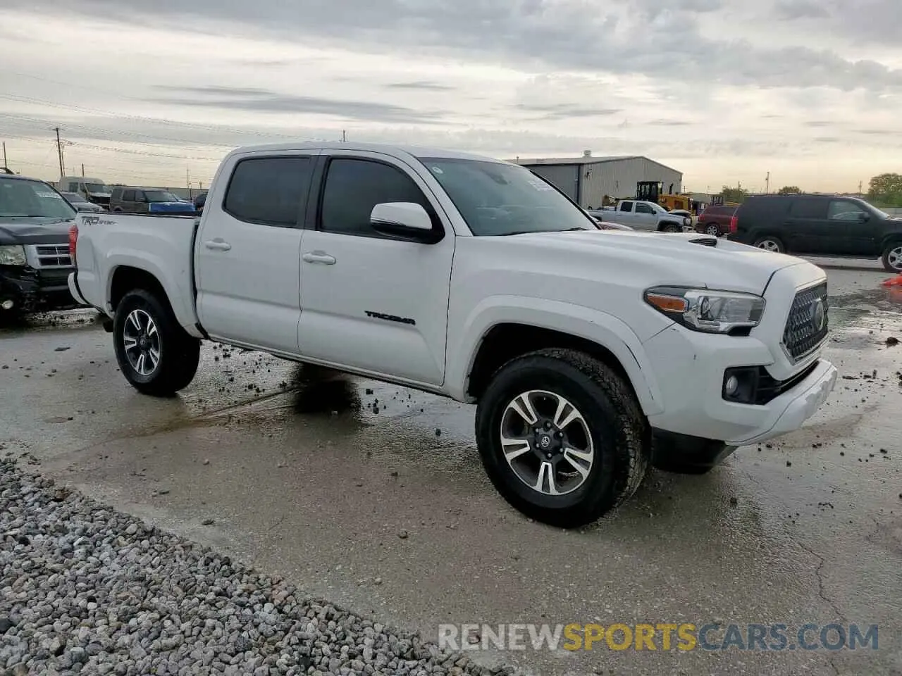 4 Photograph of a damaged car 3TMAZ5CN0KM095352 TOYOTA TACOMA 2019
