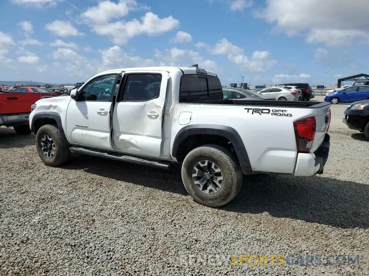 2 Photograph of a damaged car 3TMAZ5CN0KM100131 TOYOTA TACOMA 2019