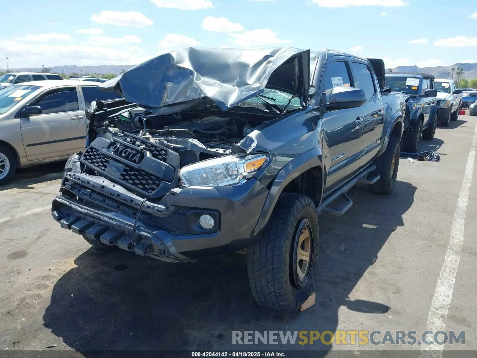 2 Photograph of a damaged car 3TMAZ5CN0KM104096 TOYOTA TACOMA 2019