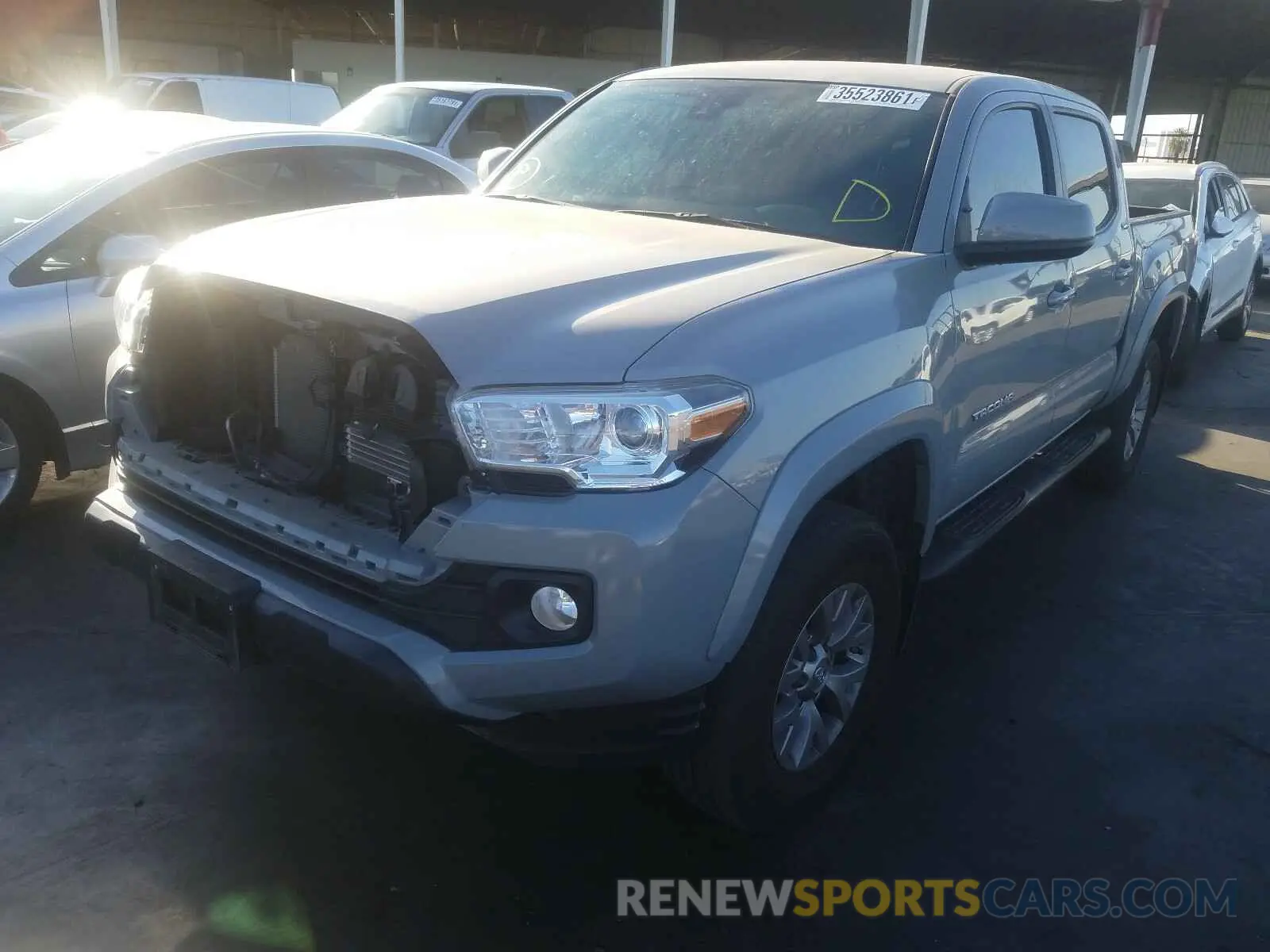 2 Photograph of a damaged car 3TMAZ5CN0KM111243 TOYOTA TACOMA 2019