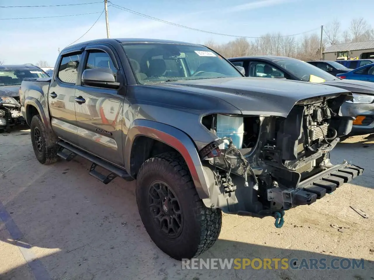 4 Photograph of a damaged car 3TMAZ5CN2KM101524 TOYOTA TACOMA 2019
