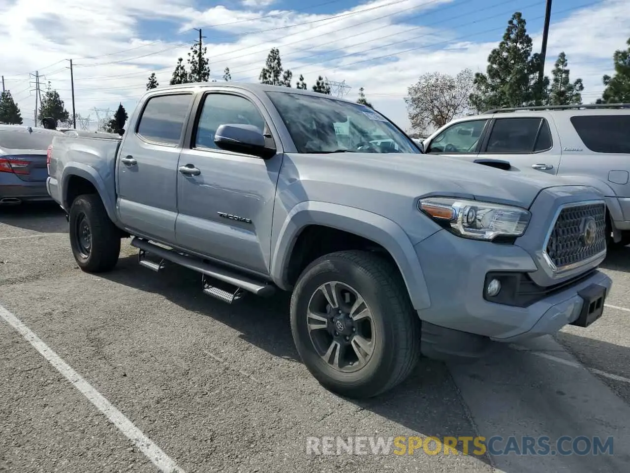 4 Photograph of a damaged car 3TMAZ5CN3KM096897 TOYOTA TACOMA 2019