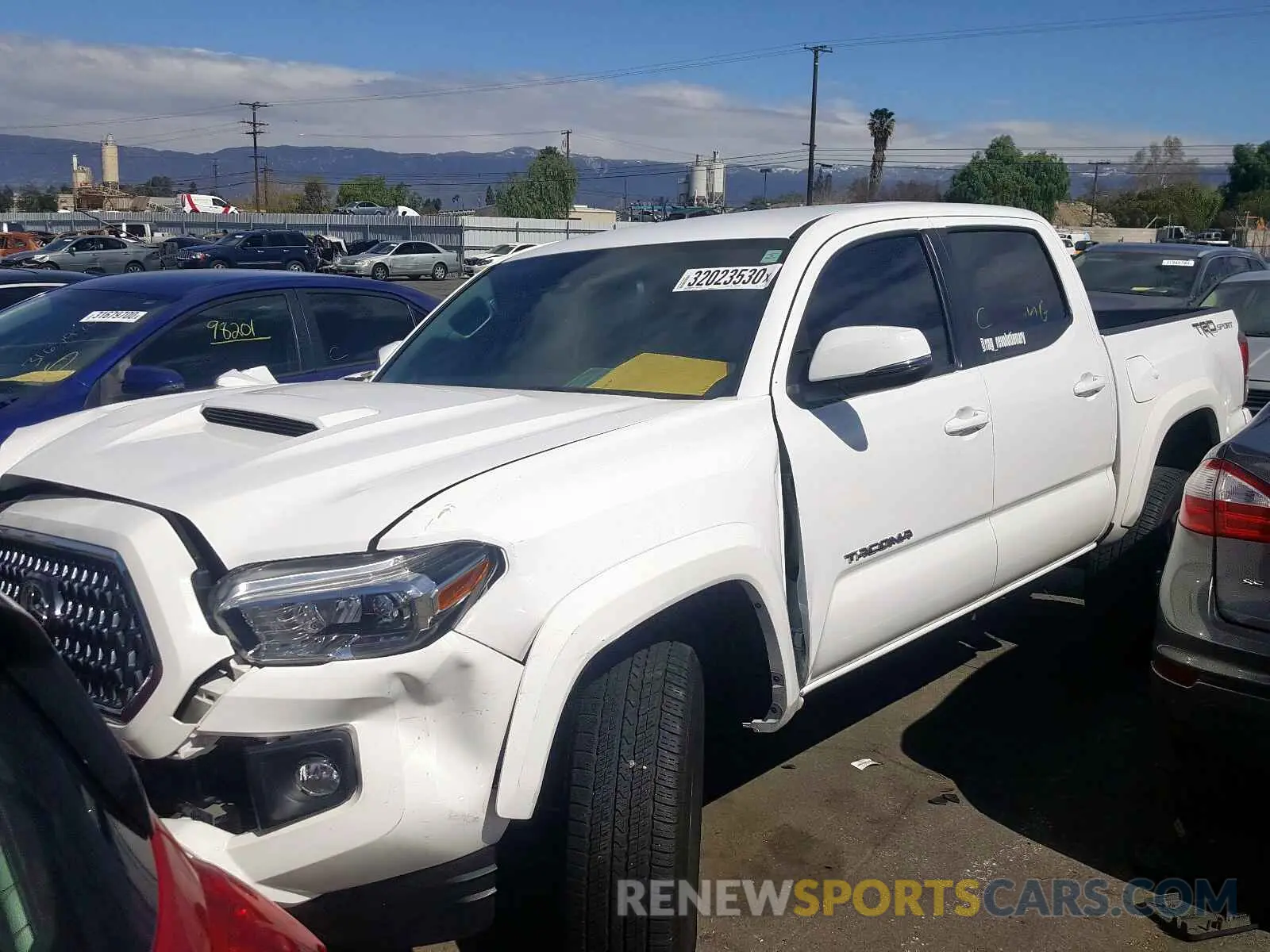 2 Photograph of a damaged car 3TMAZ5CN5KM090180 TOYOTA TACOMA 2019