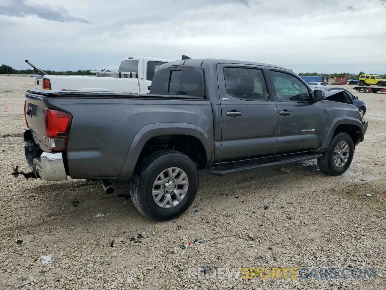 3 Photograph of a damaged car 3TMAZ5CN5KM103056 TOYOTA TACOMA 2019
